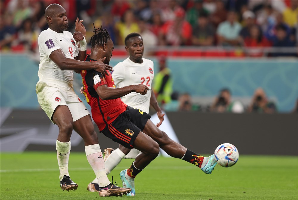 epa10323655 Michy Batshuayi of Belgium (C) scores the 1-0 during the FIFA World Cup 2022 group F soccer match between Belgium and Canada at Ahmad bin Ali Stadium in Doha, Qatar, 23 November 2022.  EPA-EFE/Tolga Bozoglu