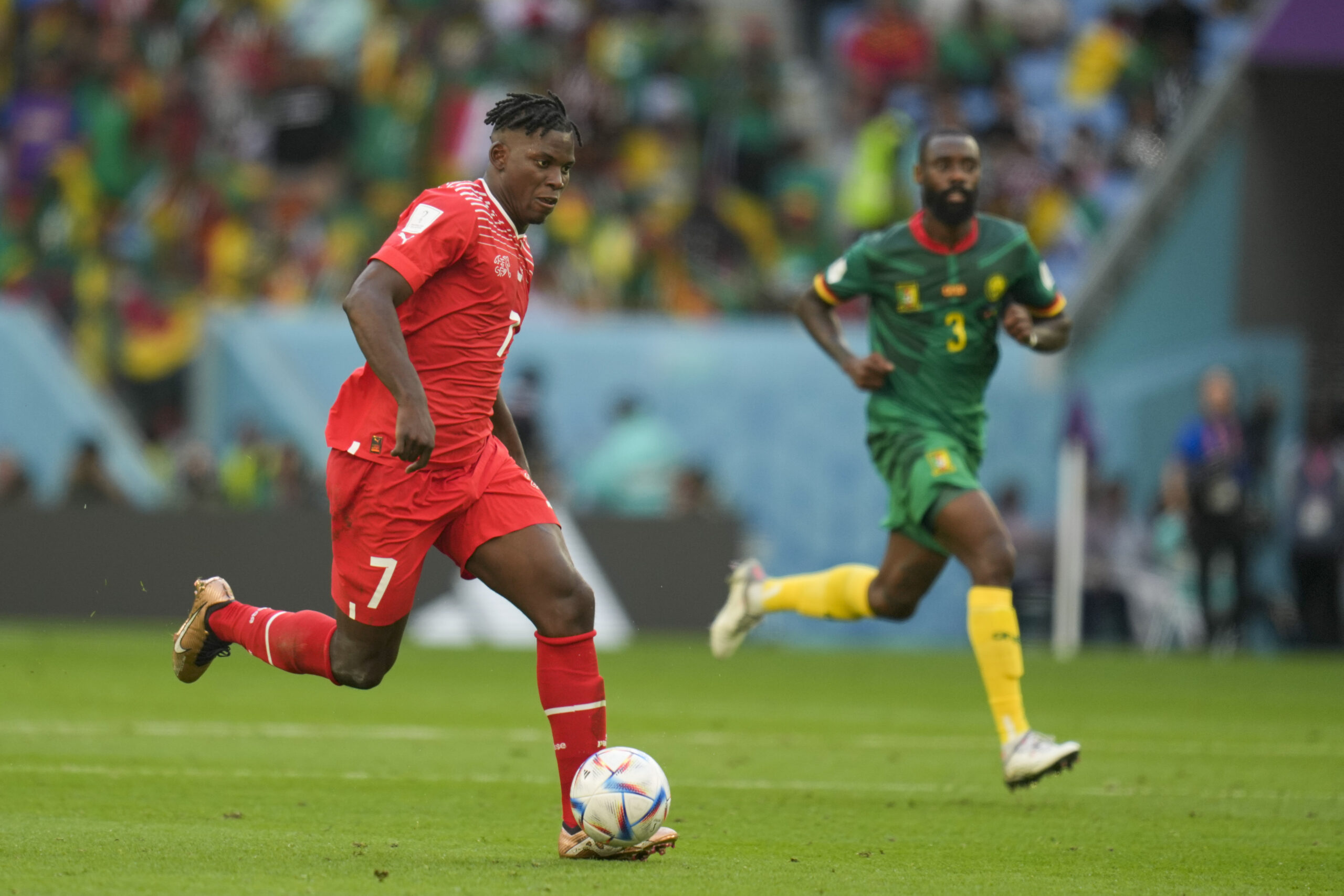 Switzerland's Breel Embolo controls the ball during the World Cup group G soccer match between Switzerland and Cameroon, at the Al Janoub Stadium in Al Wakrah, Qatar, Thursday, Nov. 24, 2022. (AP Photo/Ricardo Mazalan)