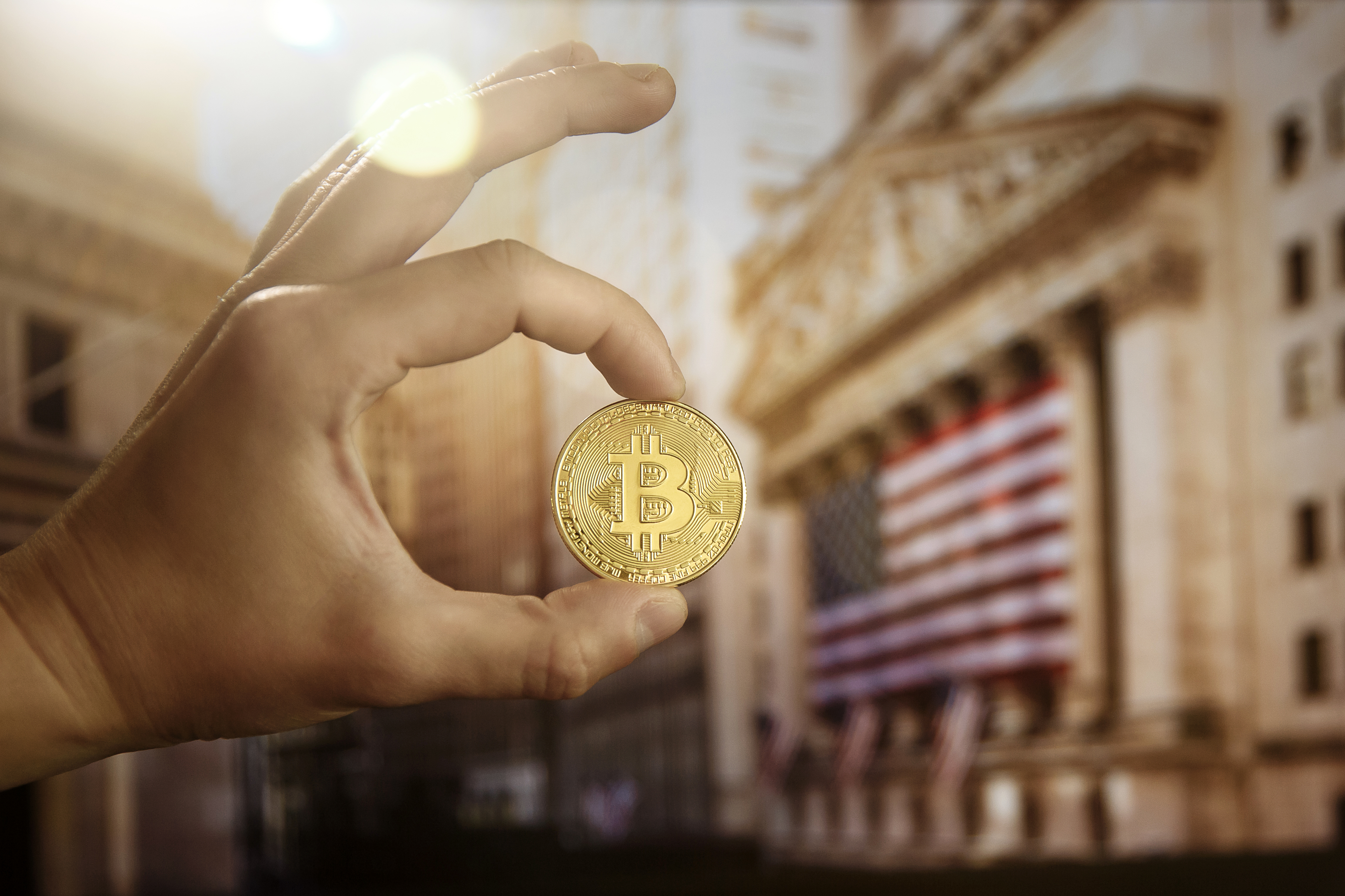 Bitcoin,Coin,Being,Held,Up,Outside,The,New,York,City