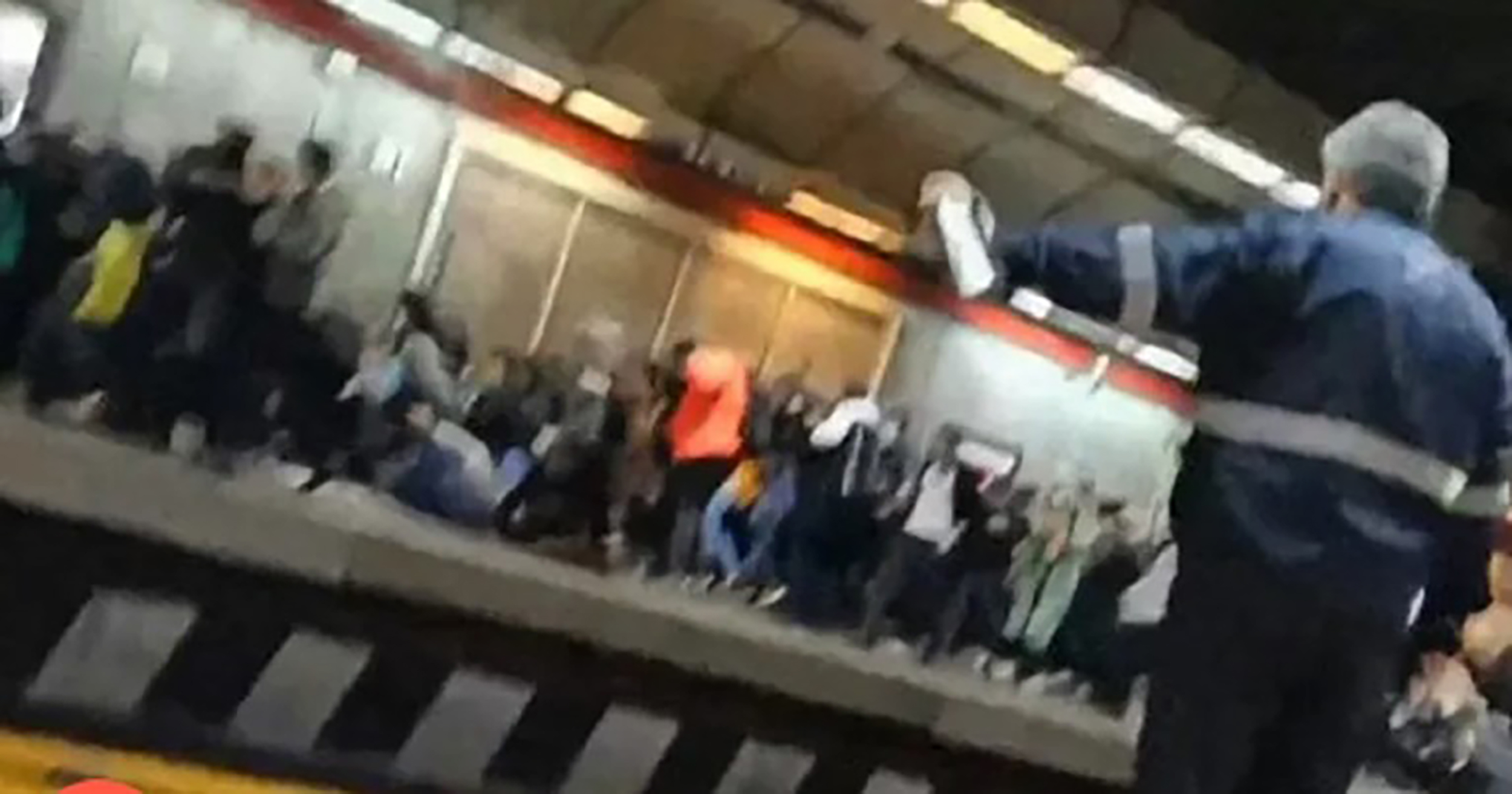 People run for cover as Iranian police open fire during protest at Tehran metro station
iran