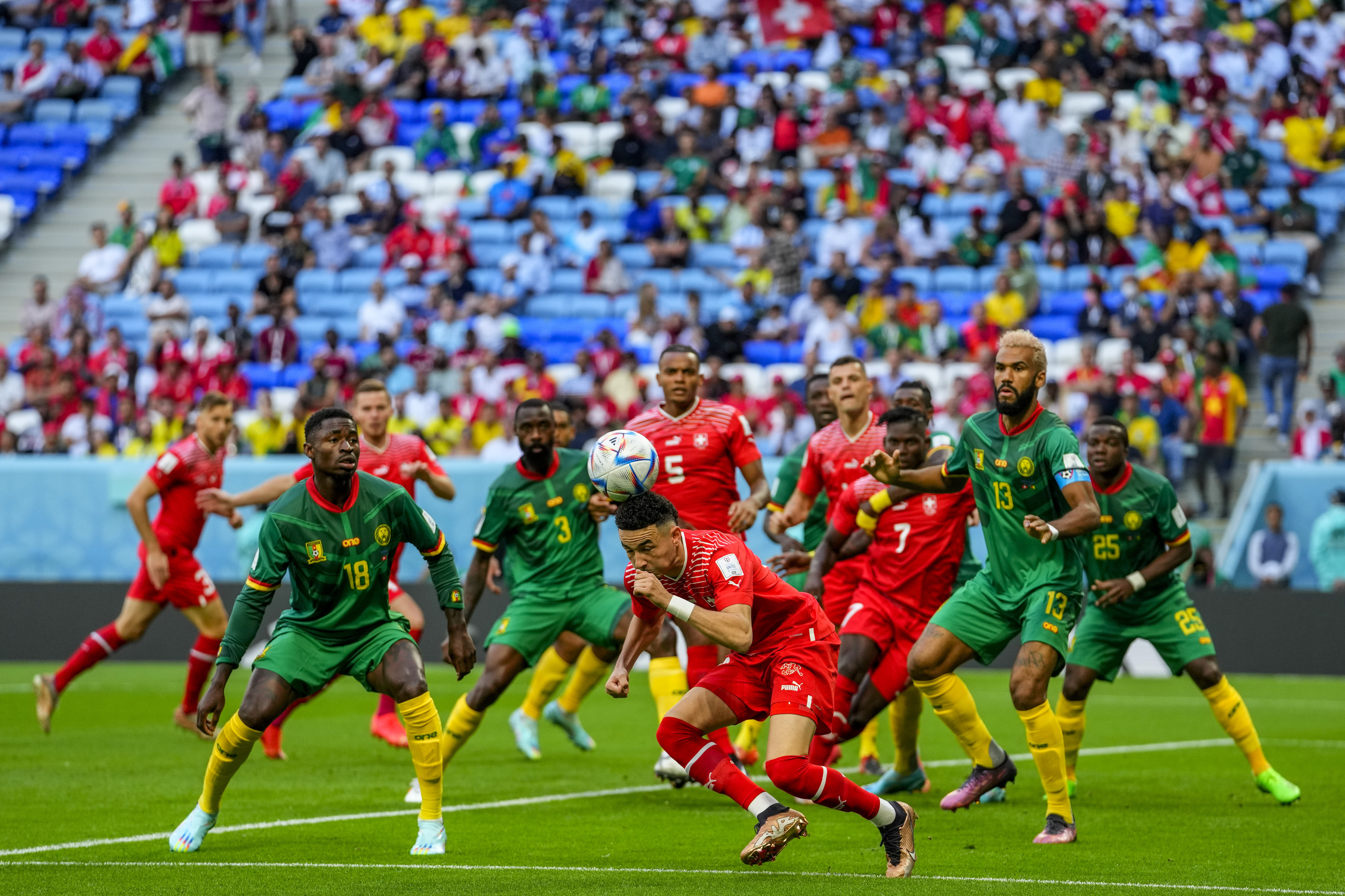 Switzerland's Ruben Vargas heads for the ball during the World Cup group G soccer match between Switzerland and Cameroon, at the Al Janoub Stadium in Al Wakrah, Qatar, Thursday, Nov. 24, 2022. (AP Photo/Petr Josek)