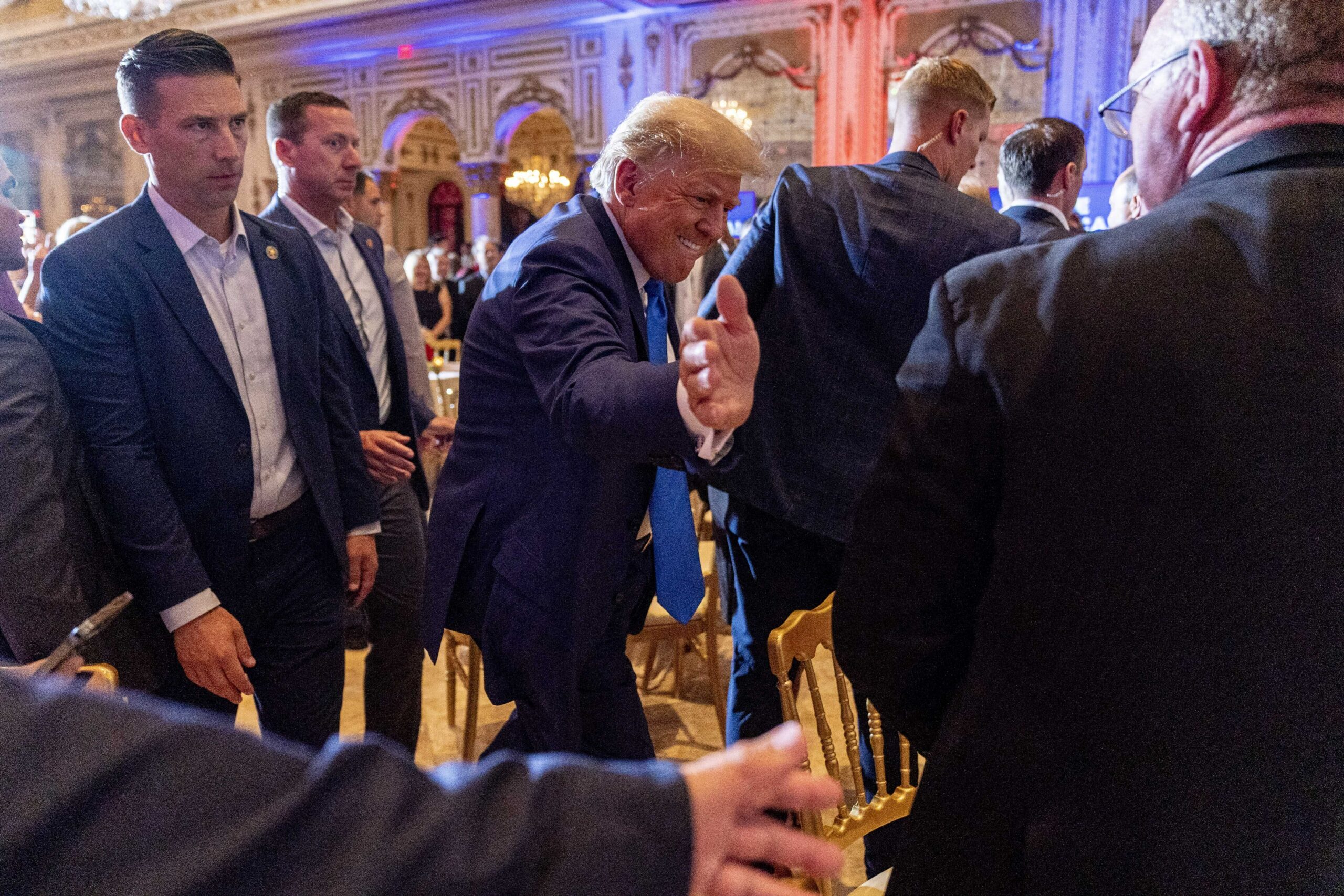 Former President Donald Trump greets guests at Mar-a-lago on Election Day, Tuesday, Nov. 8, 2022, in Palm Beach, Fla. (AP Photo/Andrew Harnik)