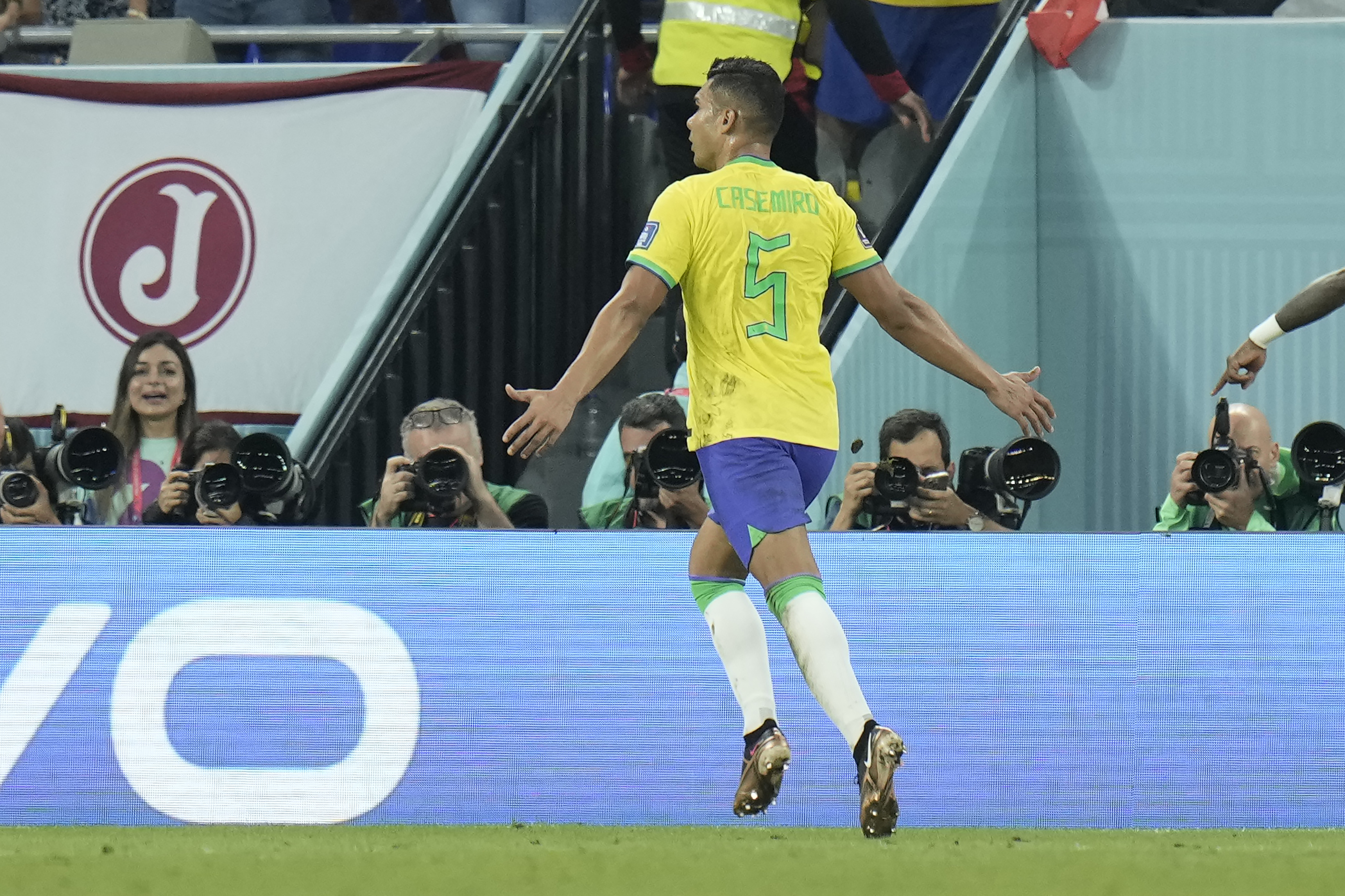Brazil's Casemiro celebrates after scoring the opening goal during the World Cup group G soccer match between Brazil and Switzerland at the Stadium 974 in Doha, Qatar, Monday, Nov. 28, 2022. (AP Photo/Hassan Ammar)