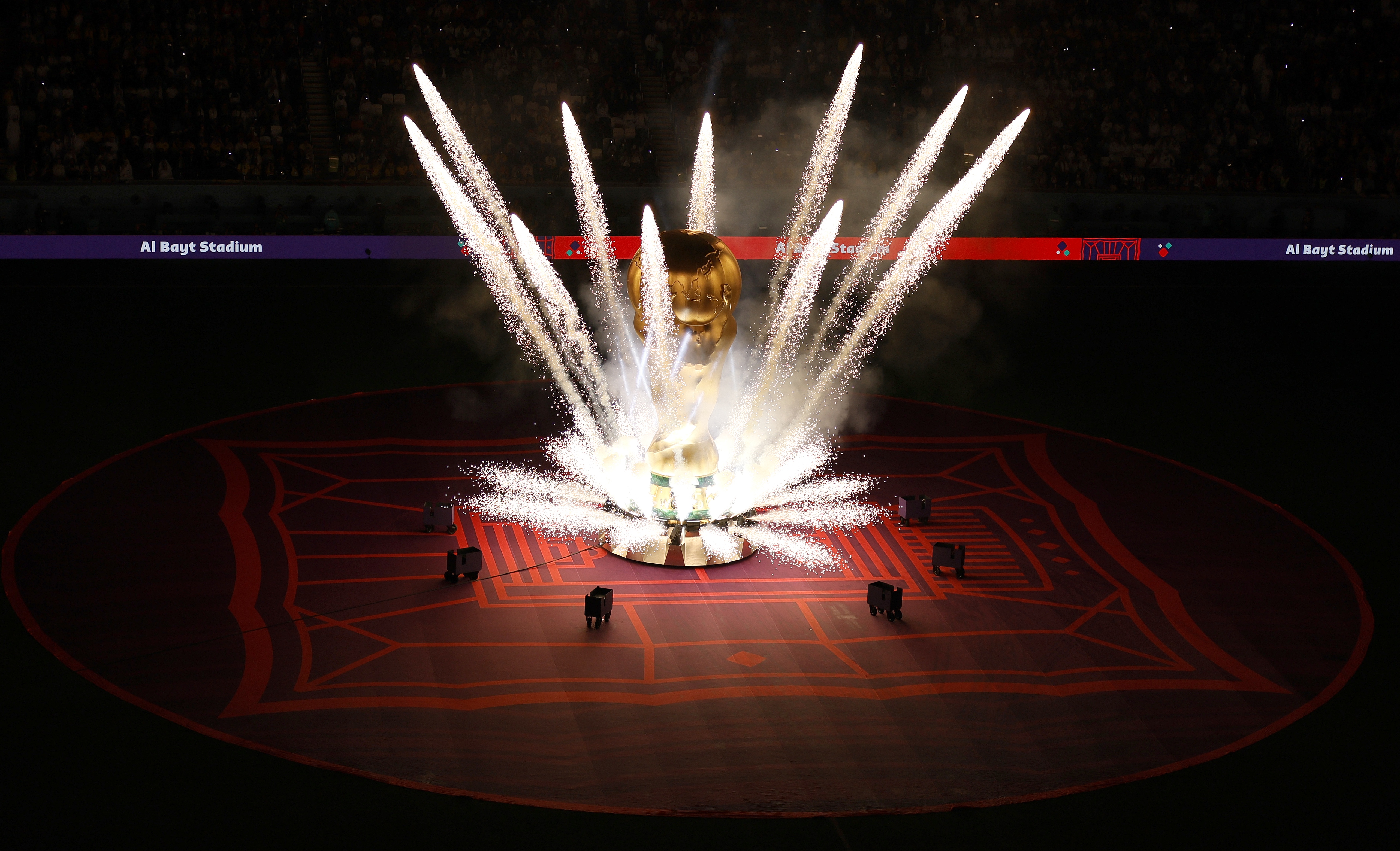 epa10316196 A giant inflatable World Cup trophy is placed in the centre of the pitch prior to the FIFA World Cup 2022 group A Opening Match between Qatar and Ecuador at Al Bayt Stadium in Al Khor, Qatar, 20 November 2022.  EPA-EFE/Ronald Wittek