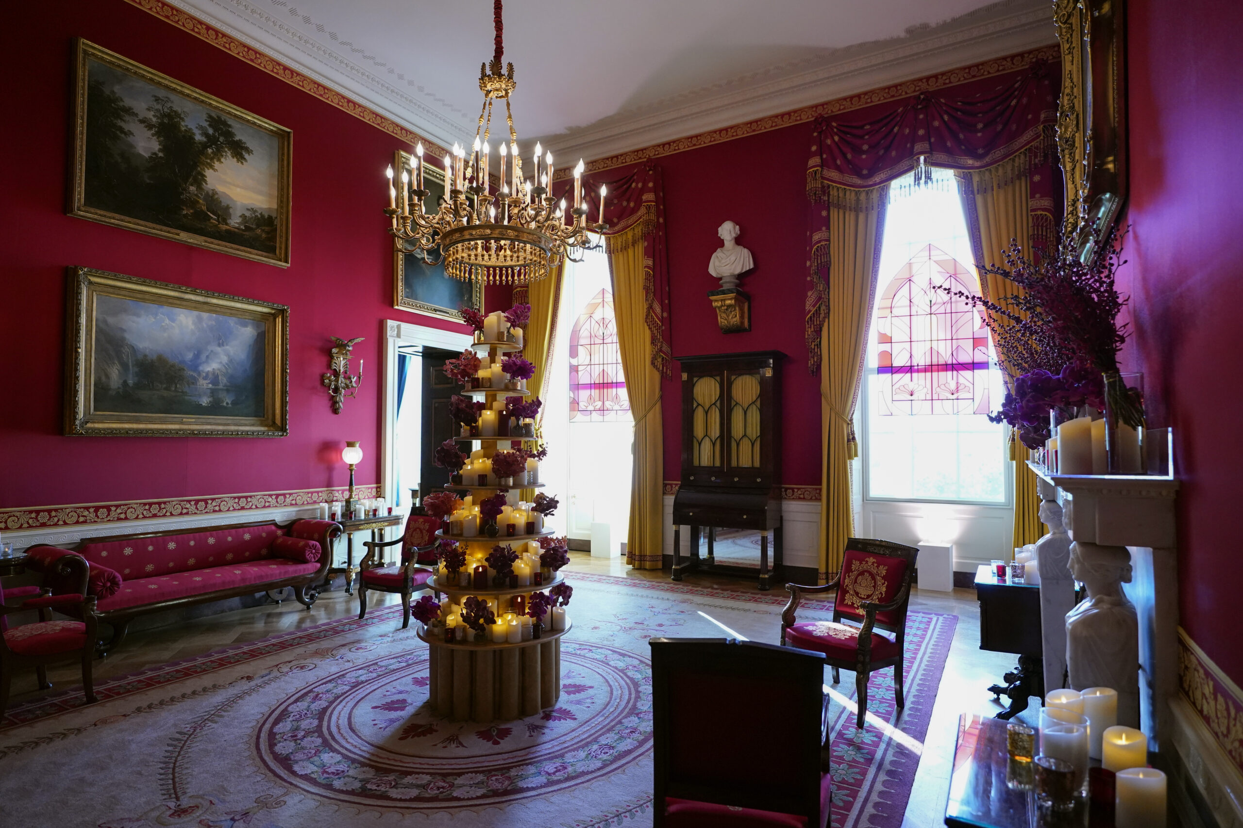 The Red Room of the White House is decorated for the holiday season during a press preview of holiday decorations at the White House, Monday, Nov. 28, 2022, in Washington. (AP Photo/Patrick Semansky)