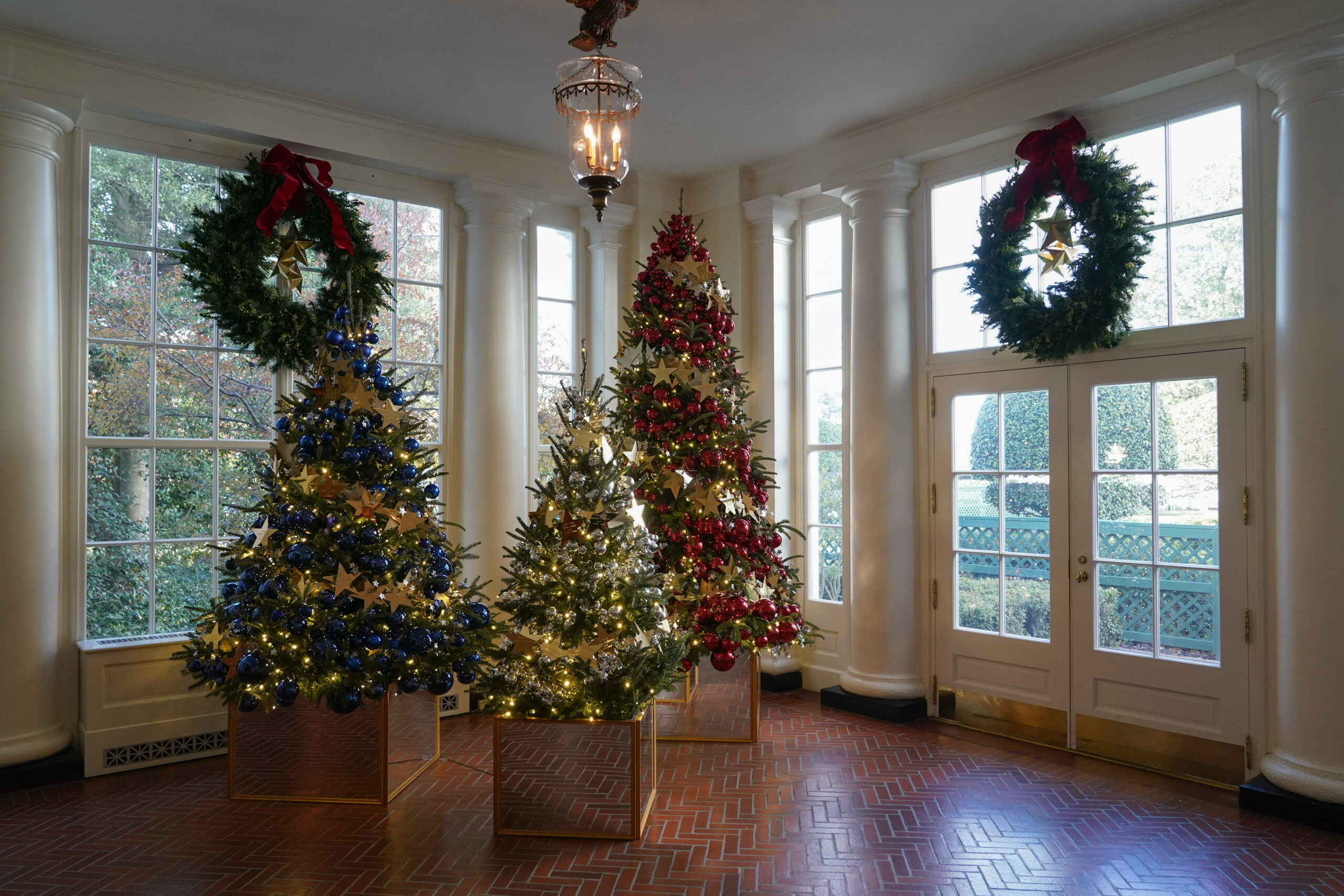 The East Wing of the White House is decorated with trees dedicated to Gold Star families for the holiday season during a press preview of holiday decorations at the White House, Monday, Nov. 28, 2022, in Washington. (AP Photo/Patrick Semansky)