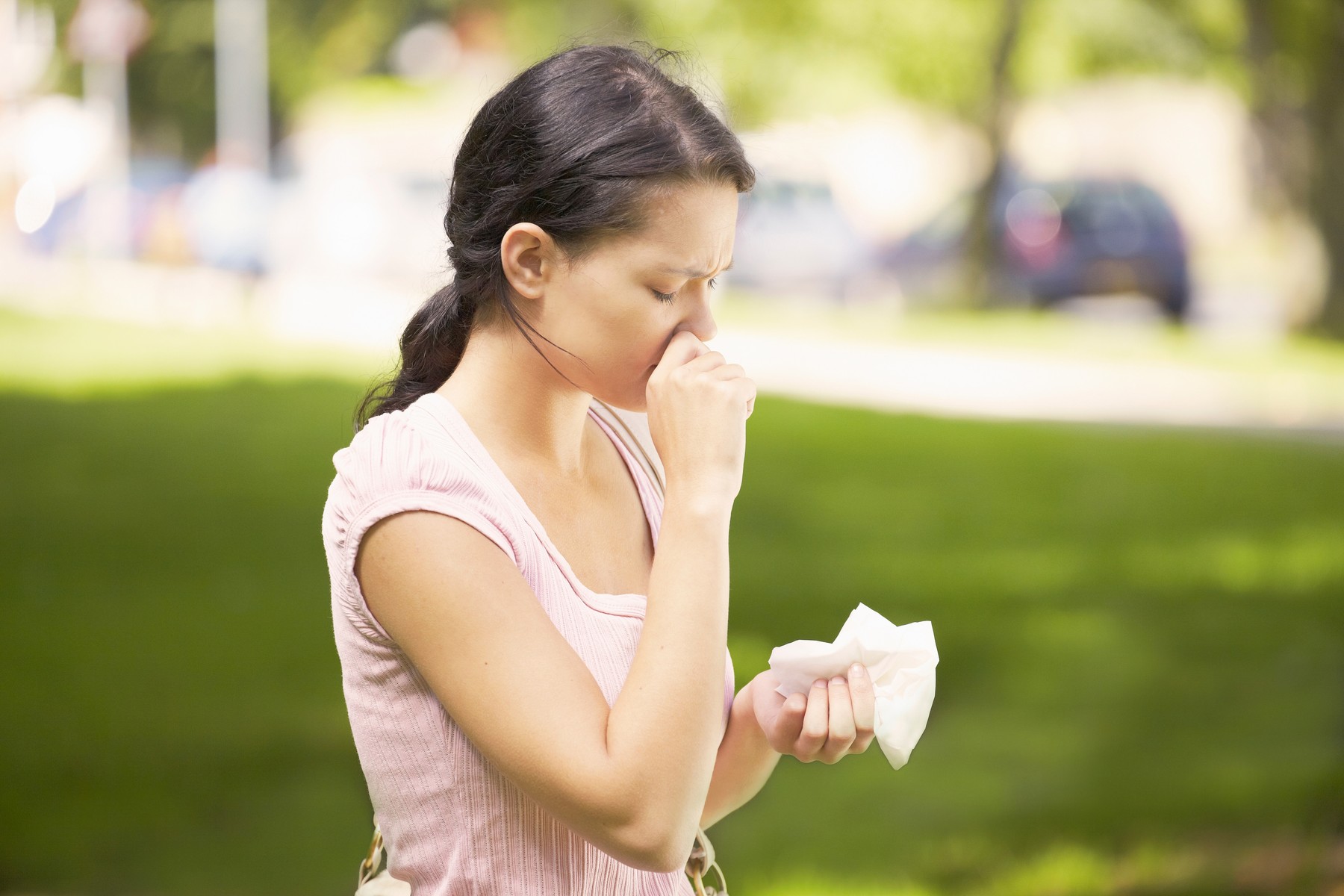 Woman suffering from hay fever