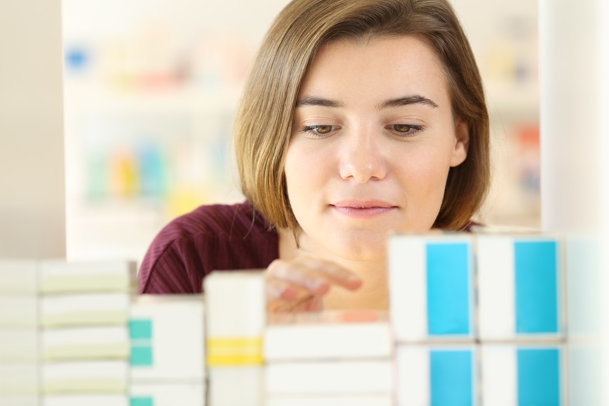 Front view portrait of a customer choosing medicines in a pharmacy shelf,Image: 528533120, License: Royalty-free, Restrictions: , Model Release: yes, Credit line: Antonio Guillen Fernández / Panthermedia / Profimedia