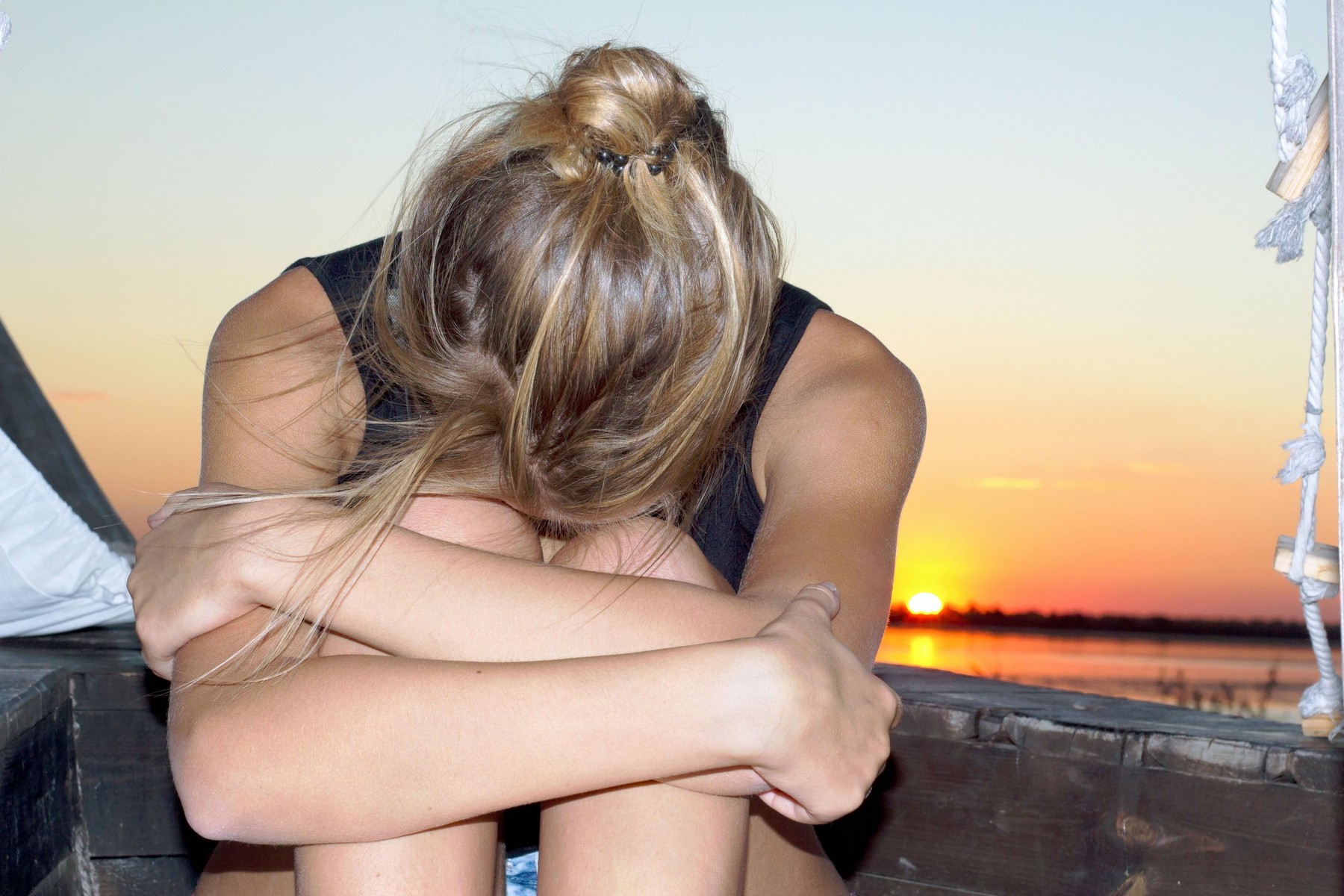 Sad teen girl sitting at stern of the ship,Image: 163276361, License: Royalty-free, Restrictions: , Model Release: yes, Credit line: Zoonar GmbH / Alamy / Alamy / Profimedia