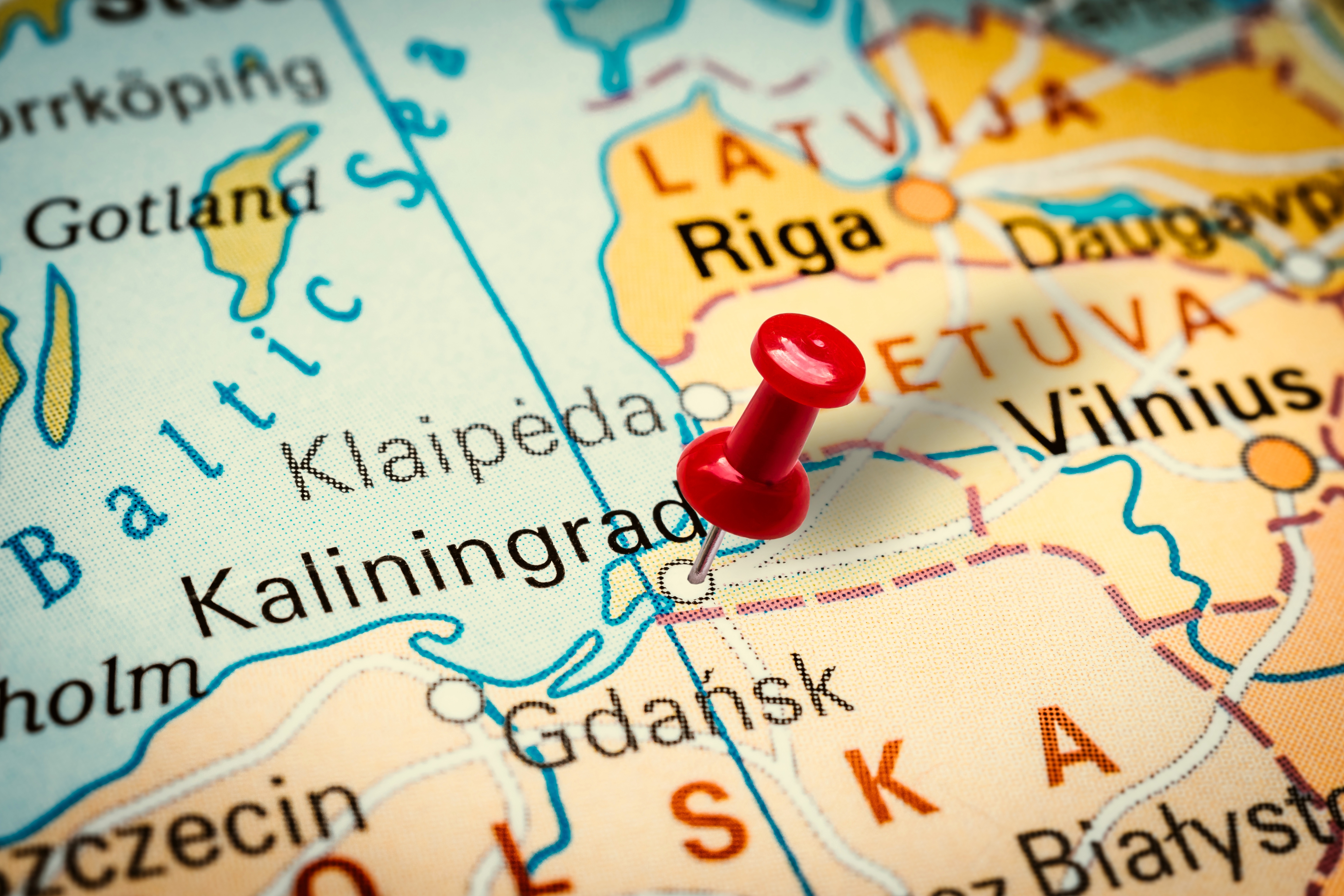 PRAGUE, CZECH REPUBLIC - JANUARY 12, 2019: Red thumbtack in a map. Pushpin pointing at Kaliningrad city in Russia.