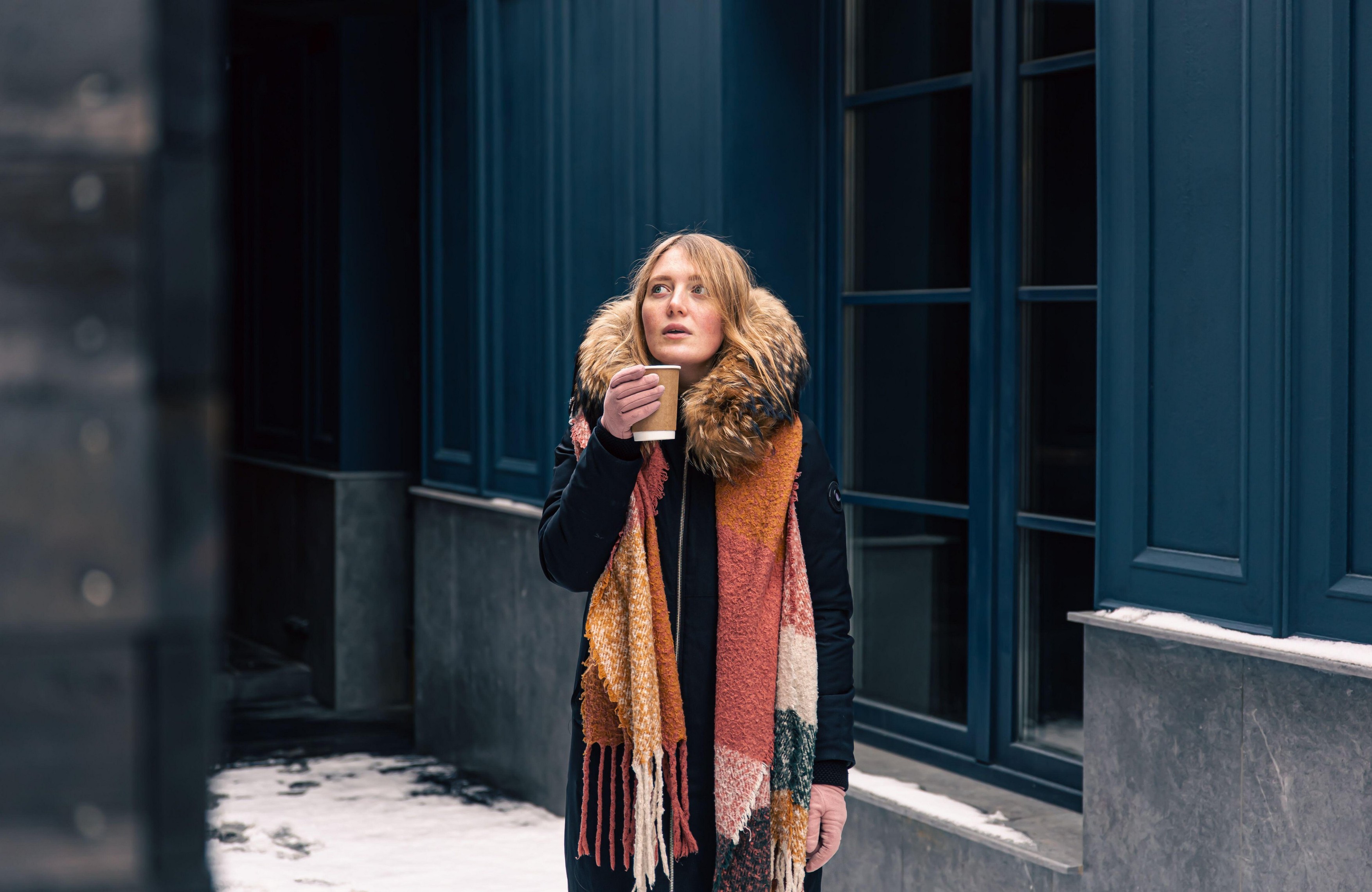 Stylish young woman on a walk in winter with a disposable cup of drink, urban style.,Image: 665985198, License: Royalty-free, Restrictions: , Model Release: no, Credit line: Pavel Iukhimetc / Alamy / Alamy / Profimedia