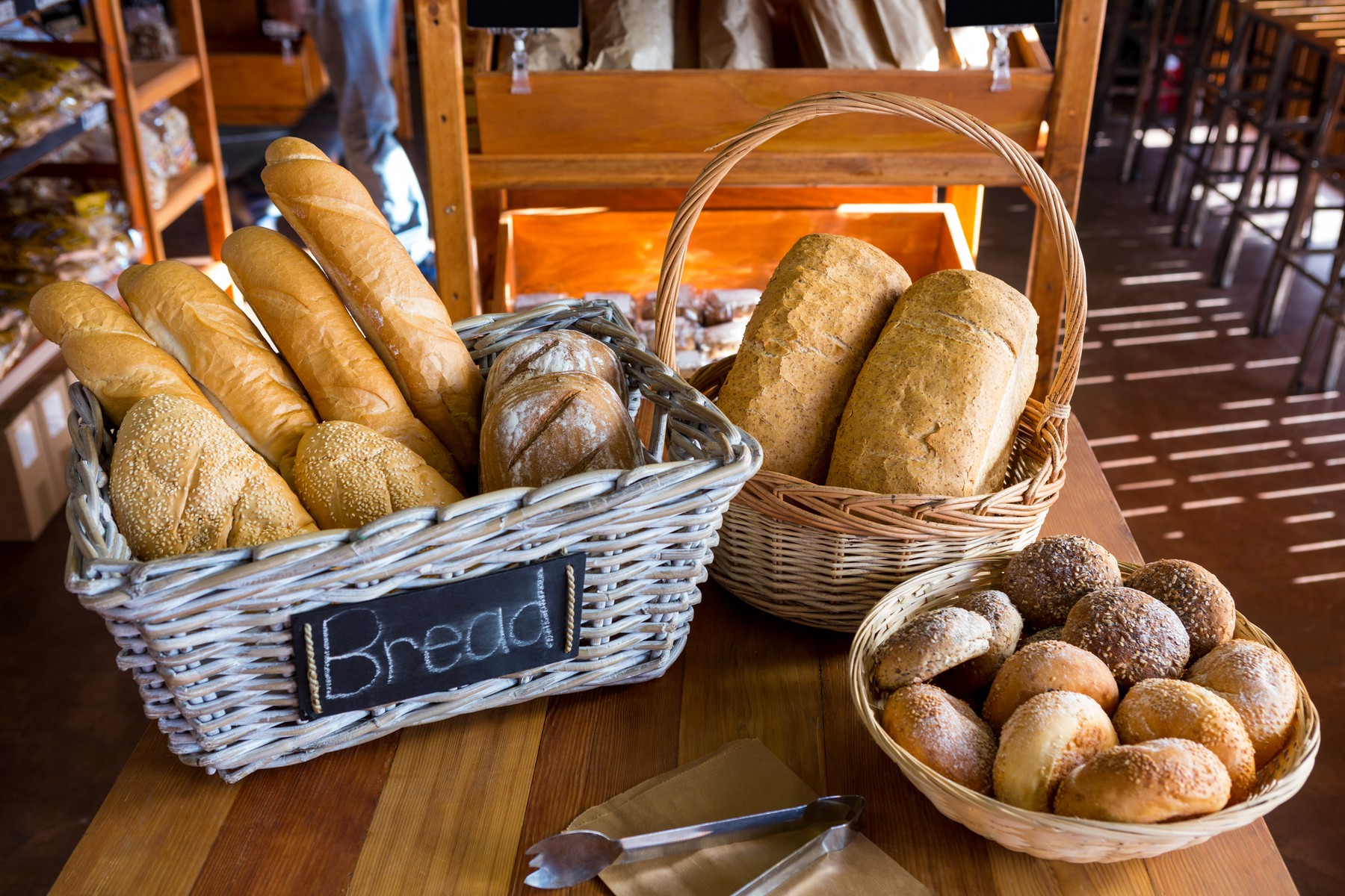 Various breads on display counter in supermarket,Image: 309069002, License: Rights-managed, Restrictions: , Model Release: yes, Credit line: - / Wavebreak / Profimedia