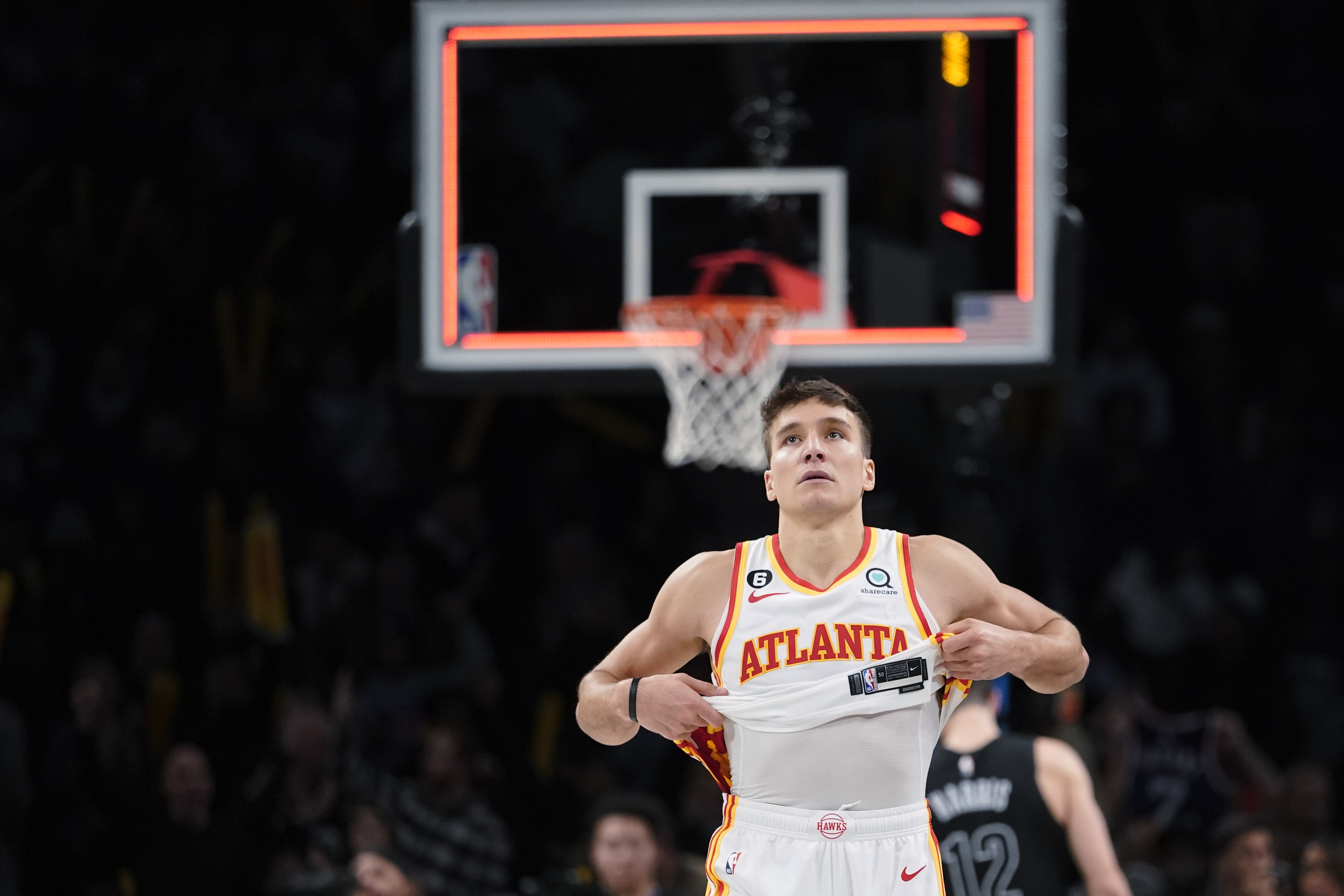 Atlanta Hawks guard Bogdan Bogdanovic leaves the court at the end of the team's NBA basketball game against the Brooklyn Nets, Friday, Dec. 9, 2022, in New York. The Nets won 120-116. (AP Photo/Mary Altaffer)