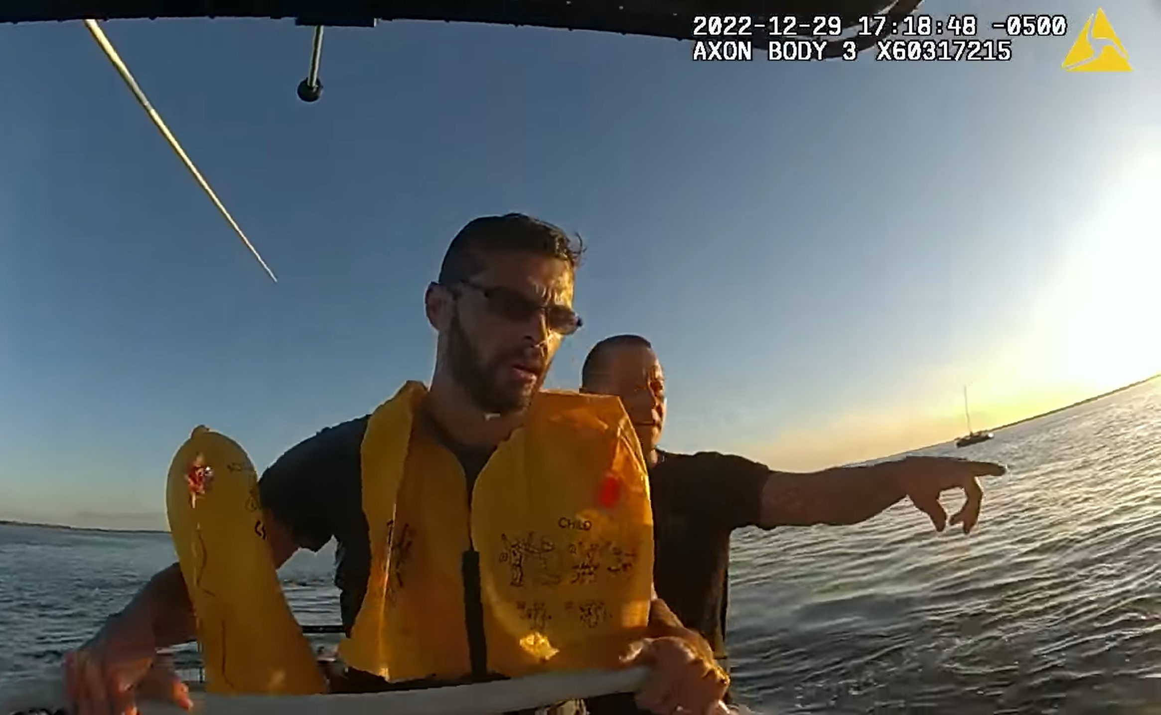 Four rescued after helicopter lands into water