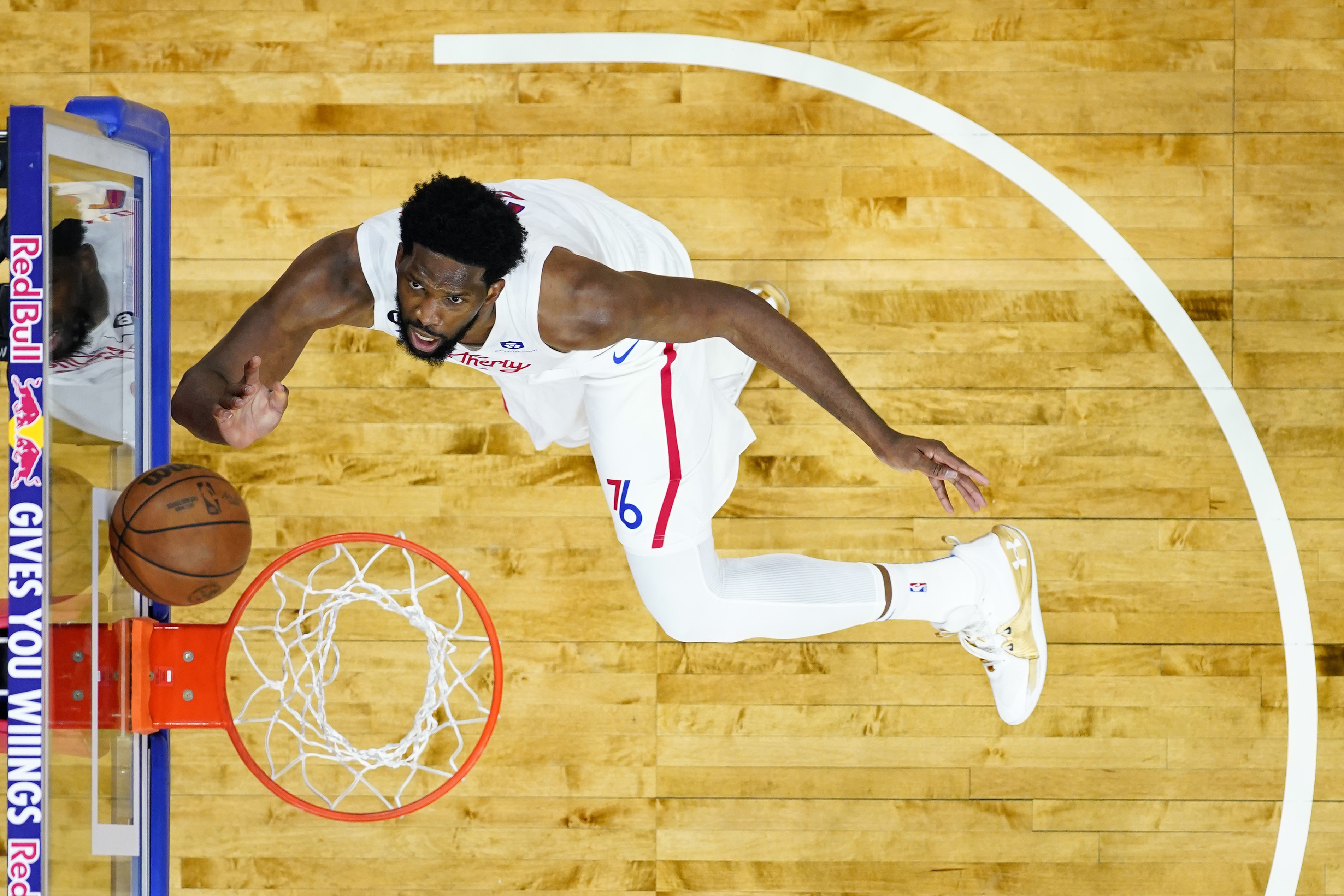 Philadelphia 76ers' Joel Embiid goes up for a shot during the second half of an NBA basketball game against the Utah Jazz, Sunday, Nov. 13, 2022, in Philadelphia. (AP Photo/Matt Slocum)