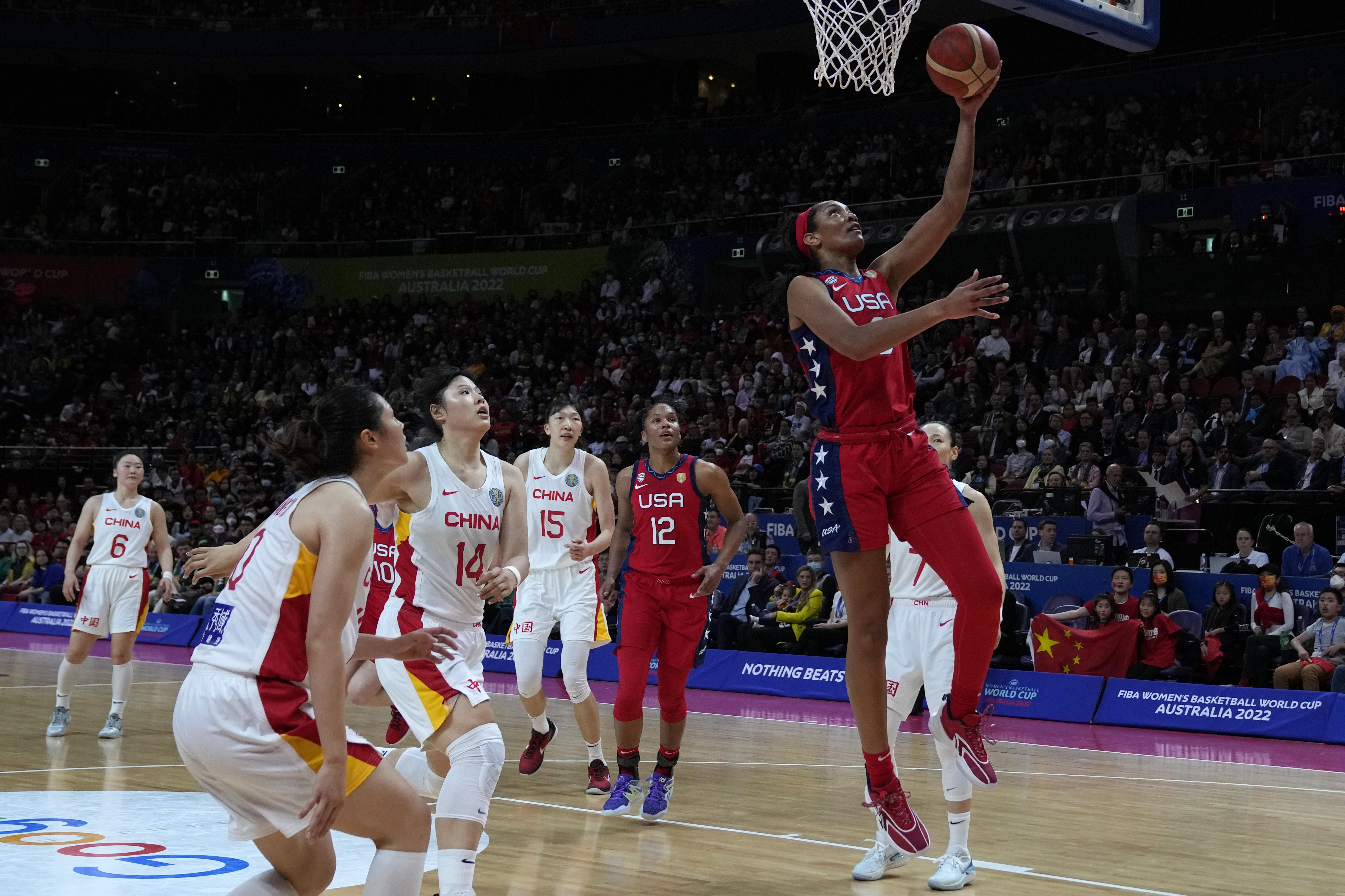 United States' A'ja Wilson, right, lays the ball up against China during their gold medal game at the women's Basketball World Cup in Sydney, Australia, Saturday, Oct. 1, 2022. (AP Photo/Rick Rycroft)