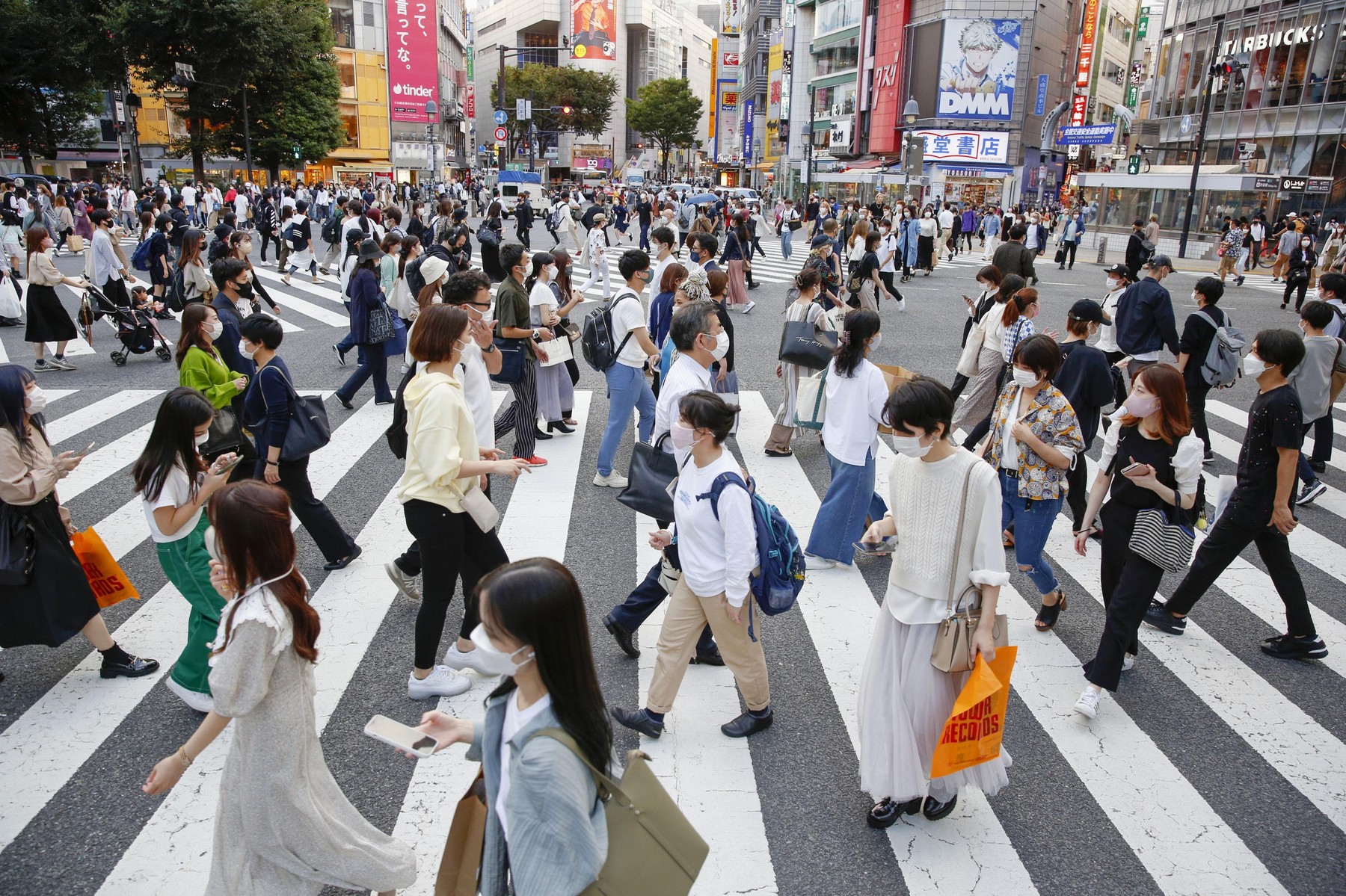 Japan decides to end COVID-19 emergency as cases fall