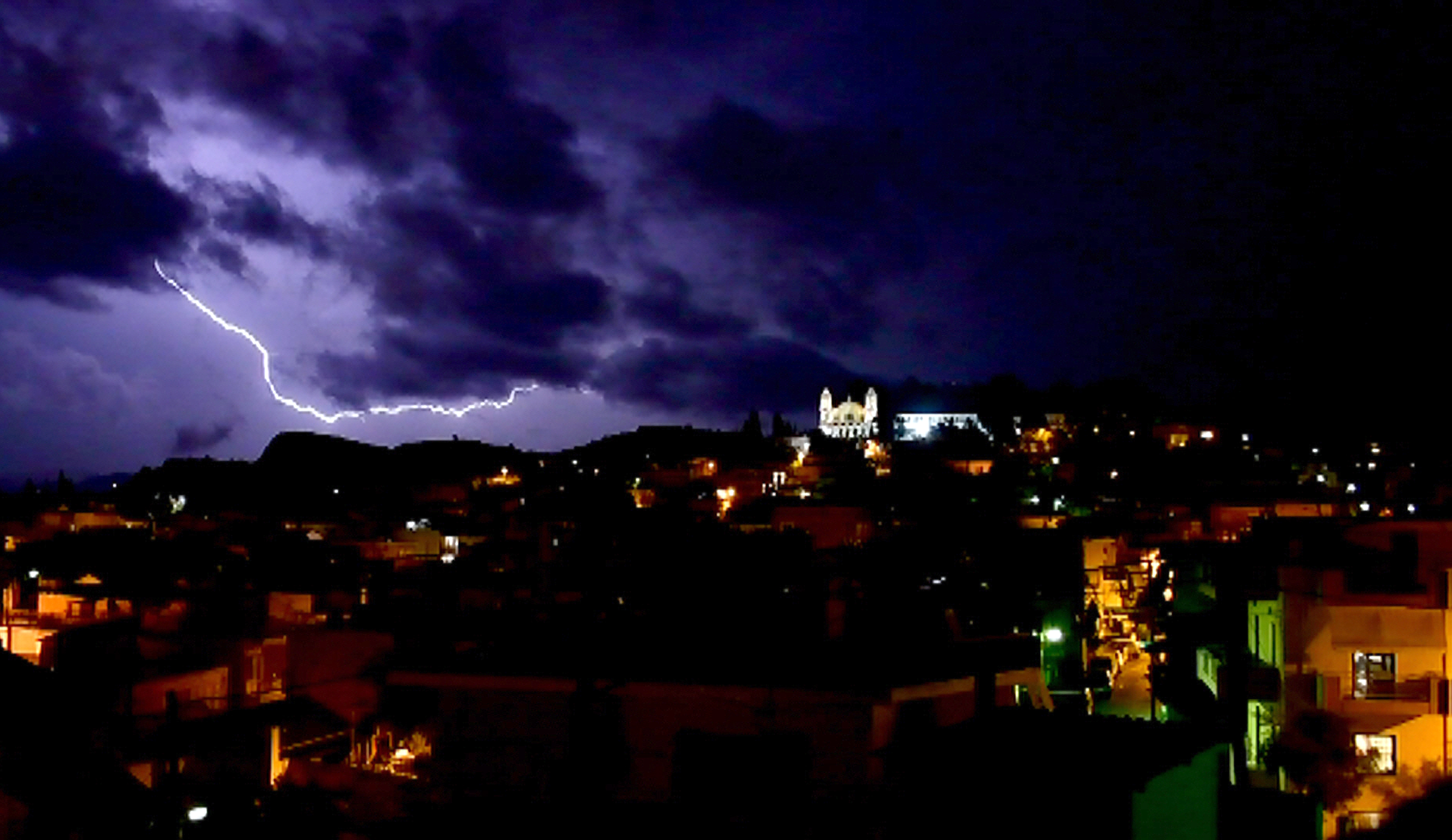 ? thunderbolt over the city of Nafplio before the start of a heavy rainfall