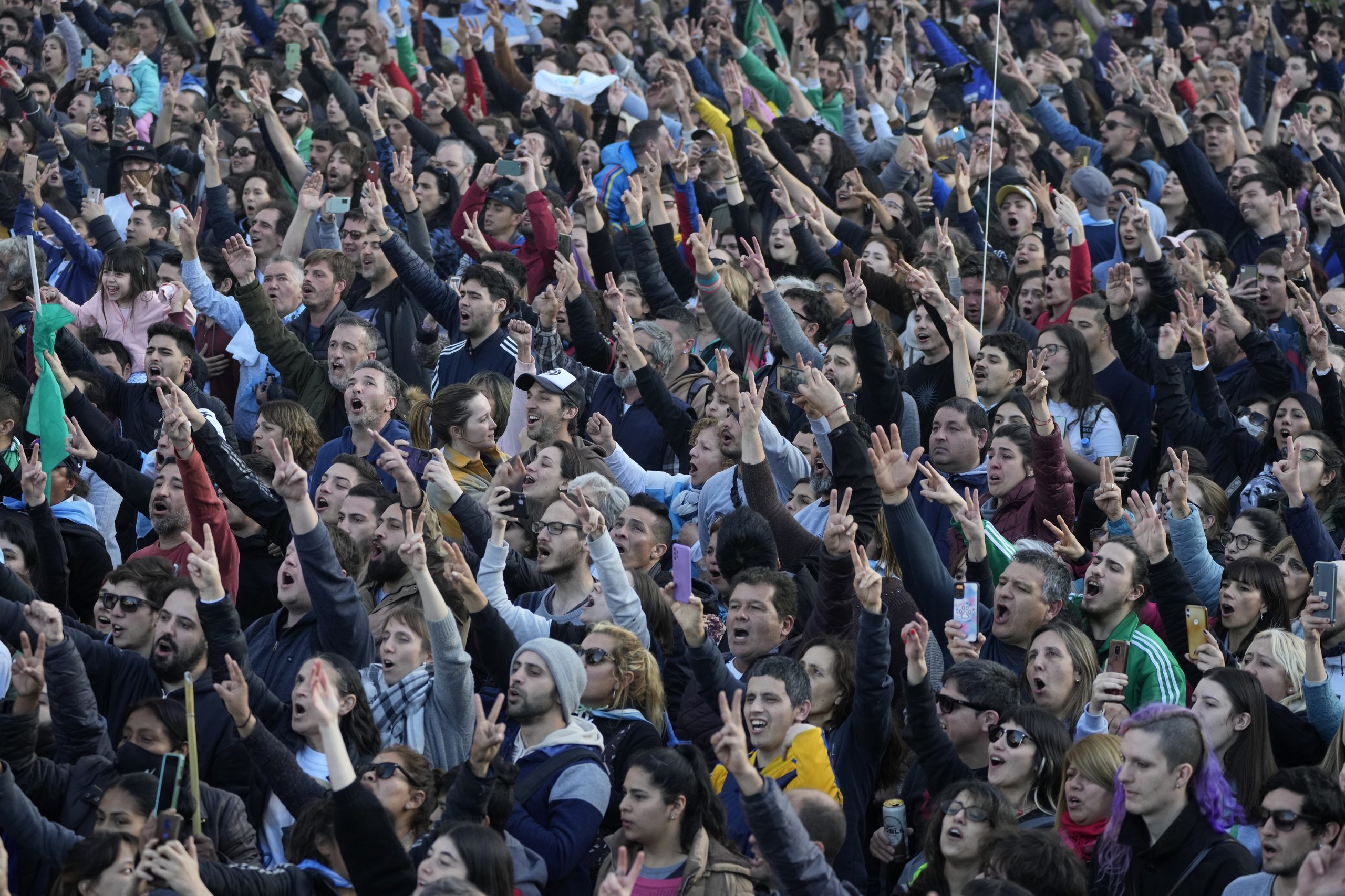 Supporters of Argentine Vice President Cristina Fernandez gather in the Plaza de Mayo, the day after a person pointed a gun at her outside her home in Buenos Aires, Argentina, Friday, Sept. 2, 2022. (AP Photo/Natacha Pisarenko)