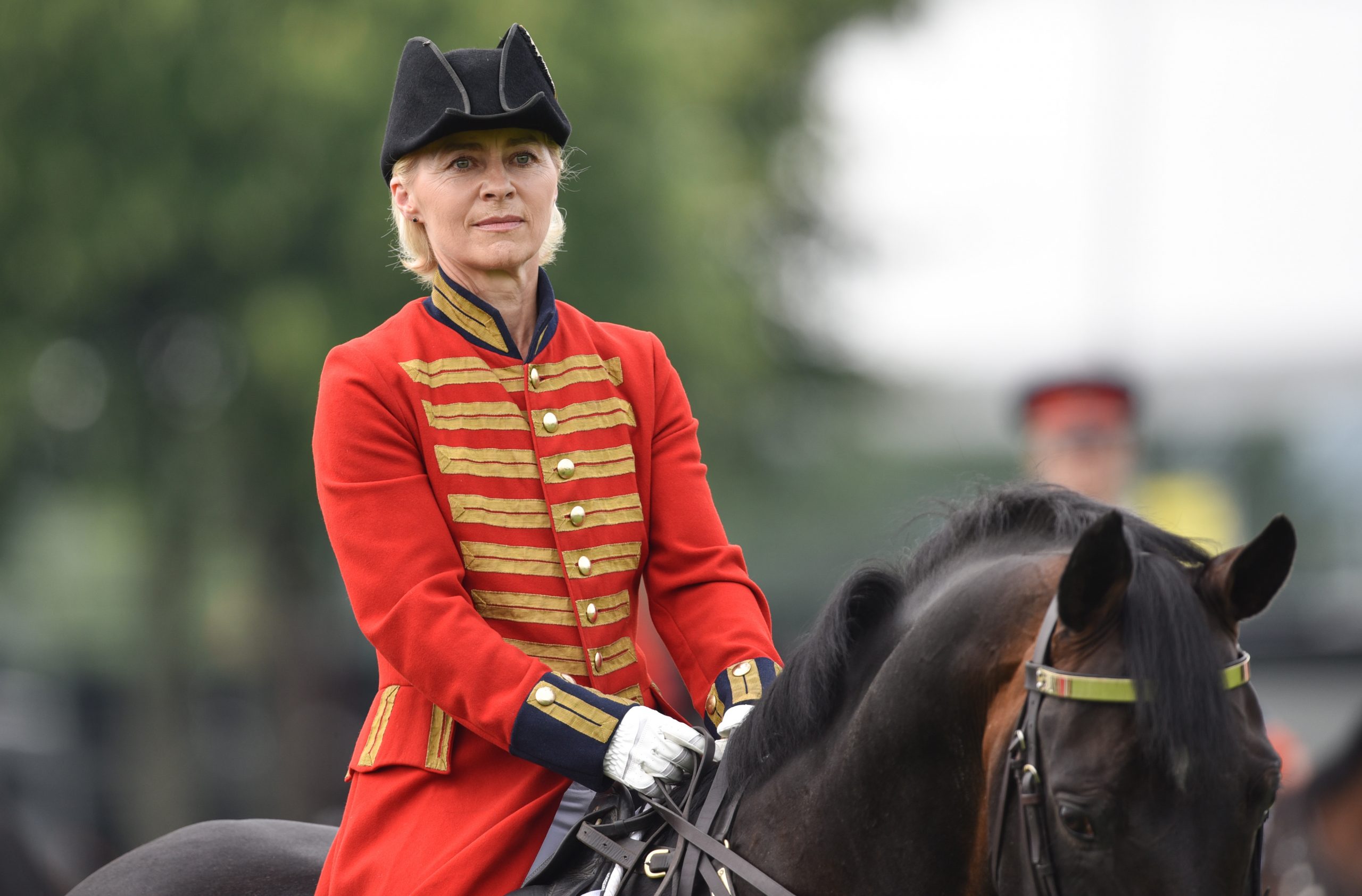 epa04878217 German Defence Minister Ursula von der Leyen rides a horse as she practices for her appearance at the opening ceremony of the FEI European Equestrian Championships on 11 August, in Aachen, Germany, 09 August 2015.  EPA/UWE ANSPRACH