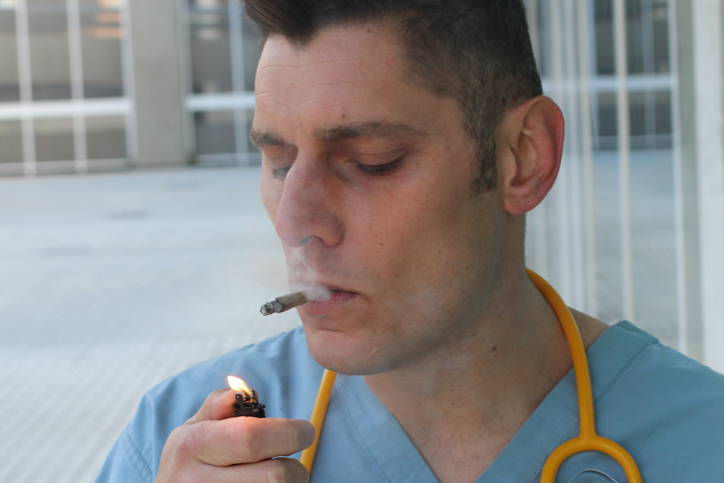 Irresponsible healthcare worker smoking in the hospital