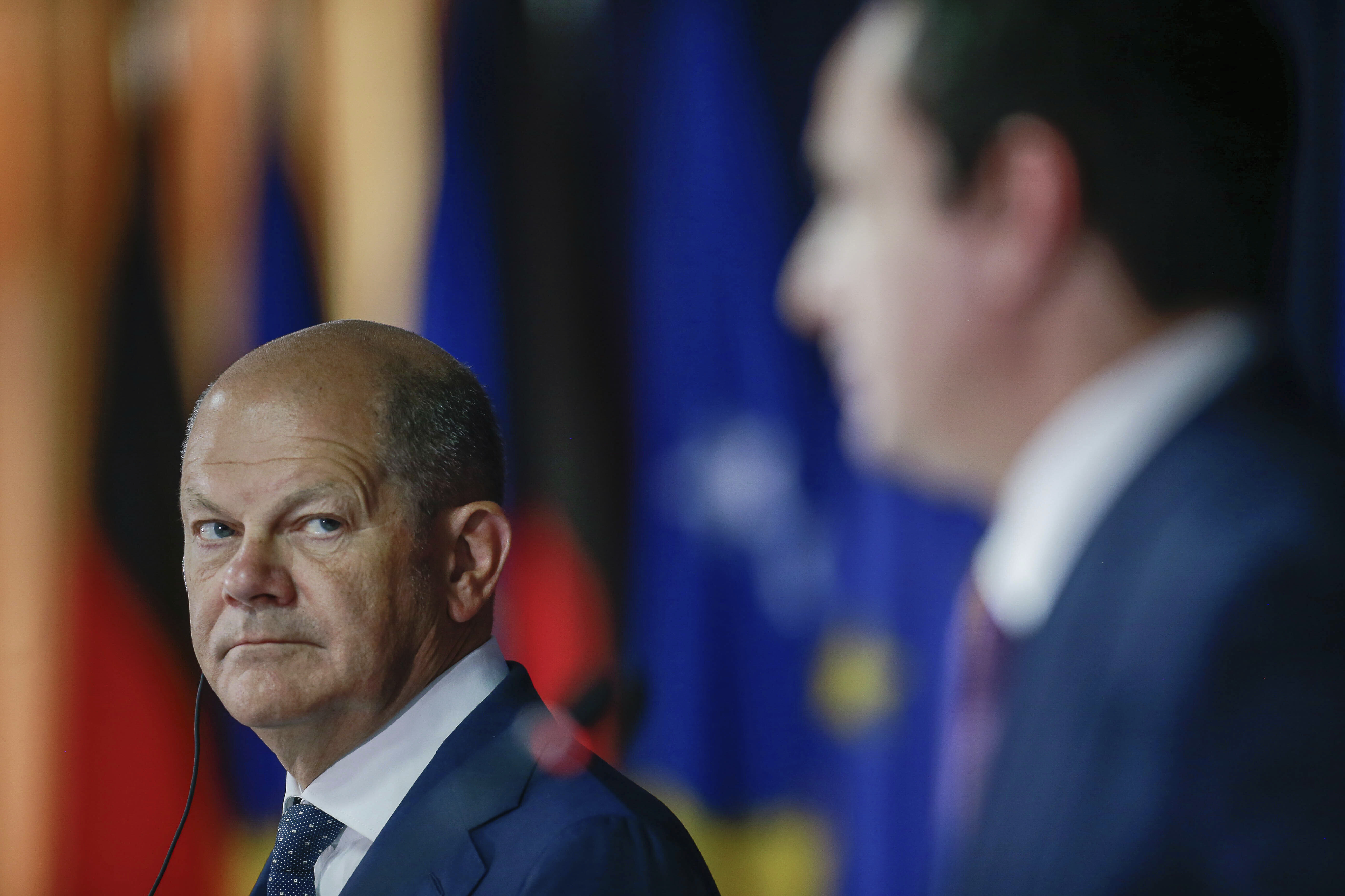 German Chancellor Olaf Scholz, left, and Kosovo Prime Minister Albin Kurti attend a joint press conference in Kosovo capital Pristina on Friday, June 10, 2022. Scholz is on a one day visit to the country. (AP Photo/Visar Kryeziu)