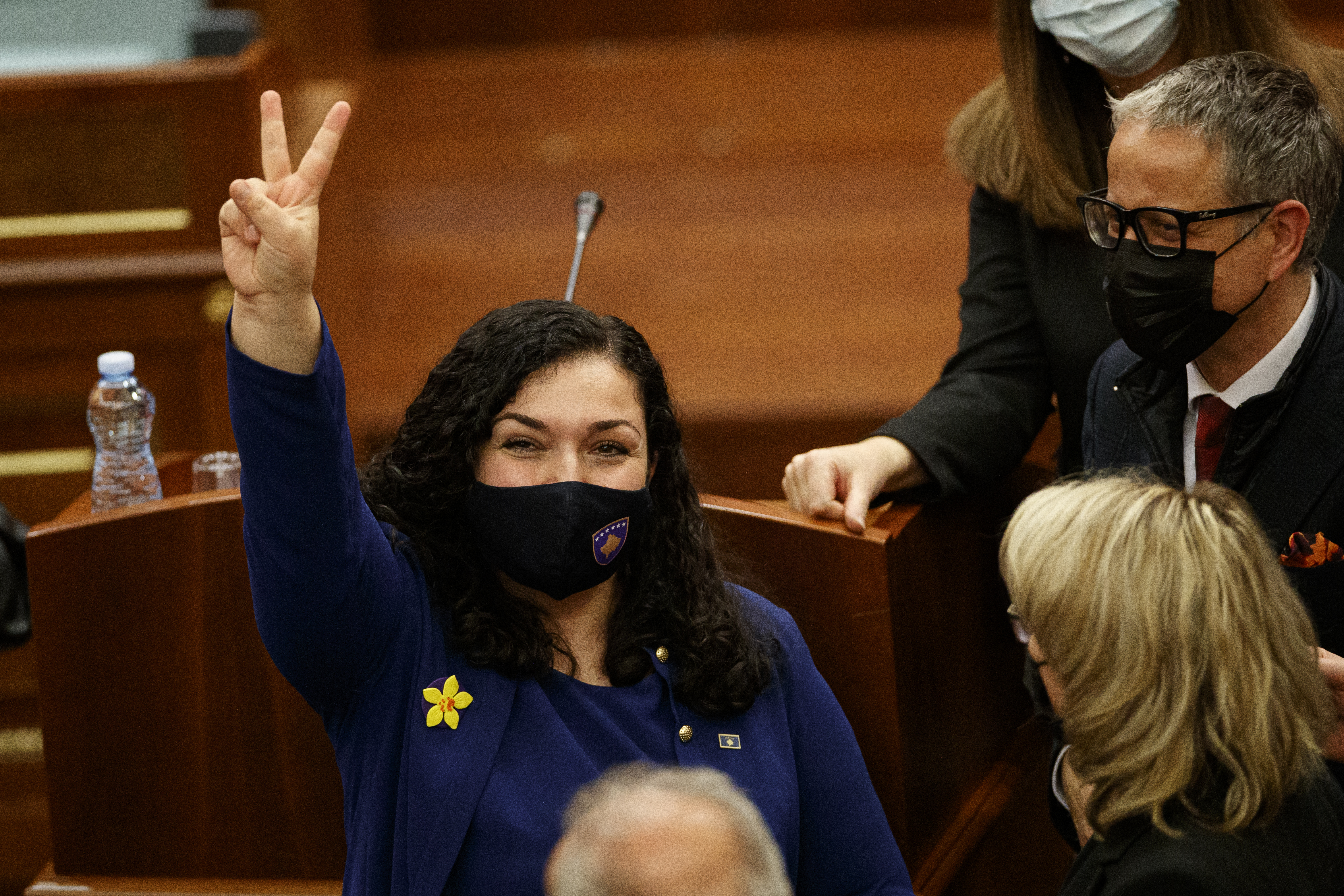 epa09116014 Newly elected Kosovo President Vjosa Osmani gestures after she was sworn-in at the parliament in Pristina, Kosovo, 04 April 2021.  EPA-EFE/VALDRIN XHEMAJ
