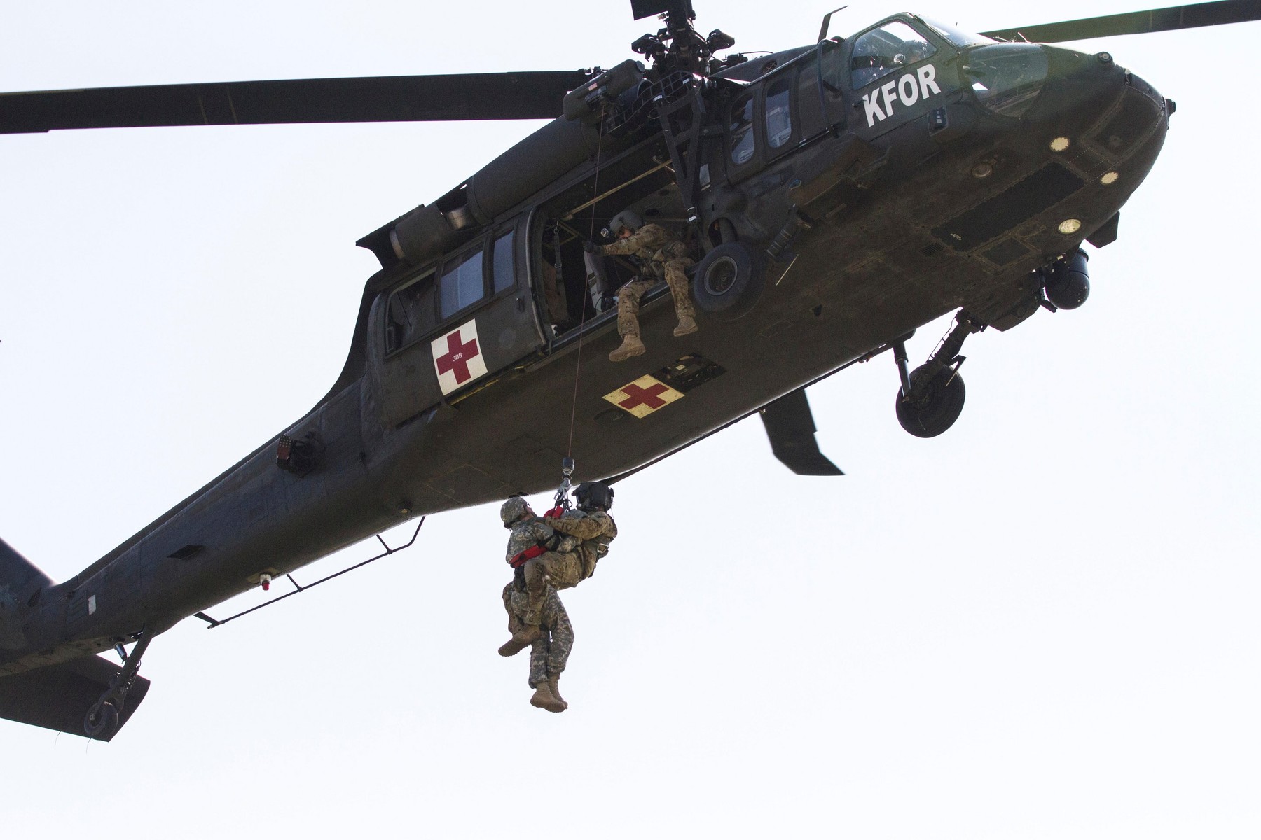 A Kosovo Security Force Explosive Ordnance Detachment team member unties a set of munitions during Silver Sabre 17-1 on Camp Pomozotin, Kosovo, April 12. The exercise demonstrated the capabilities of the KFOR EOD members as they cleared a building filled