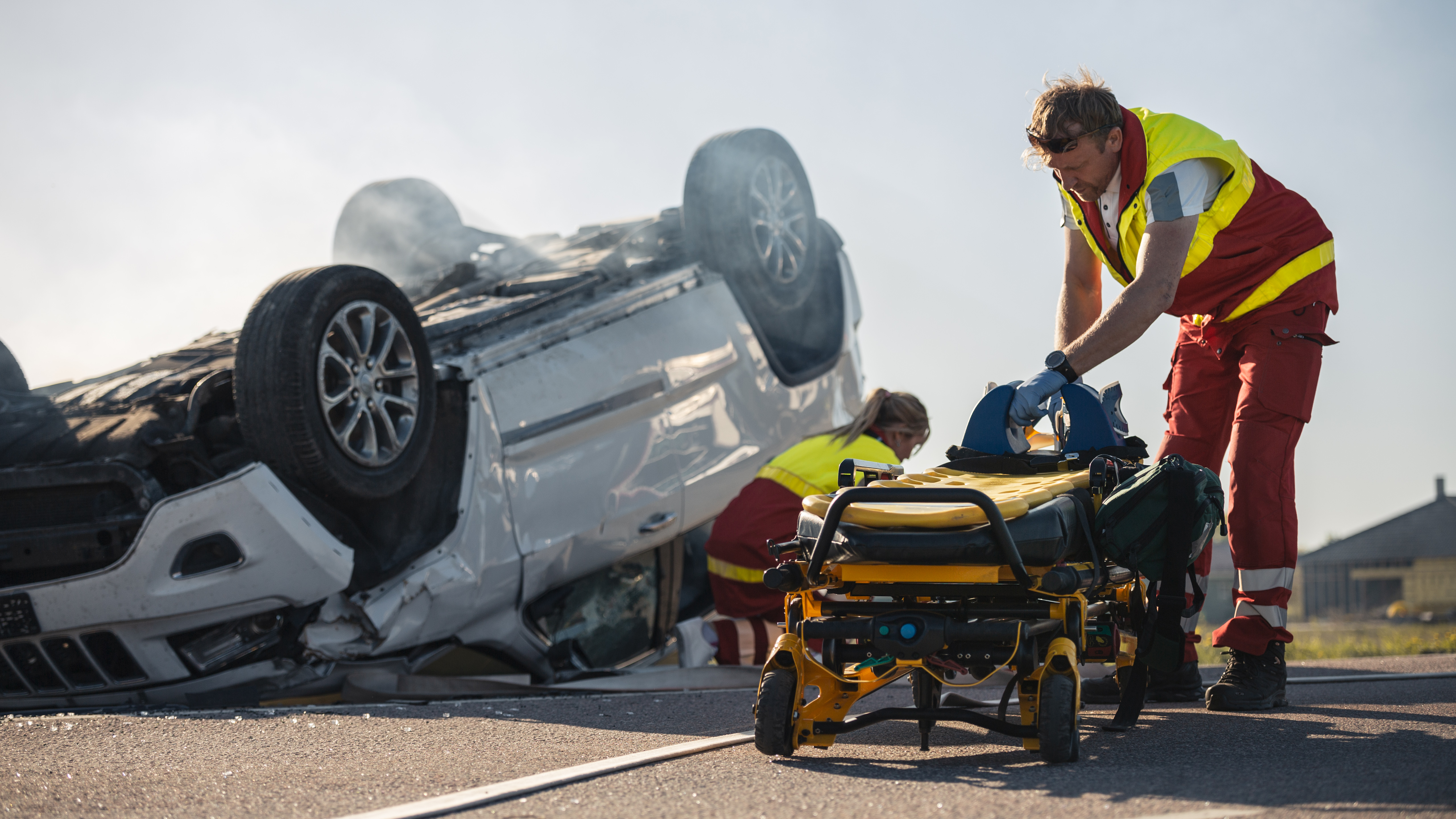 Paramedics,And,Firefighters,Arrive,On,The,Car,Crash,Traffic,Accident