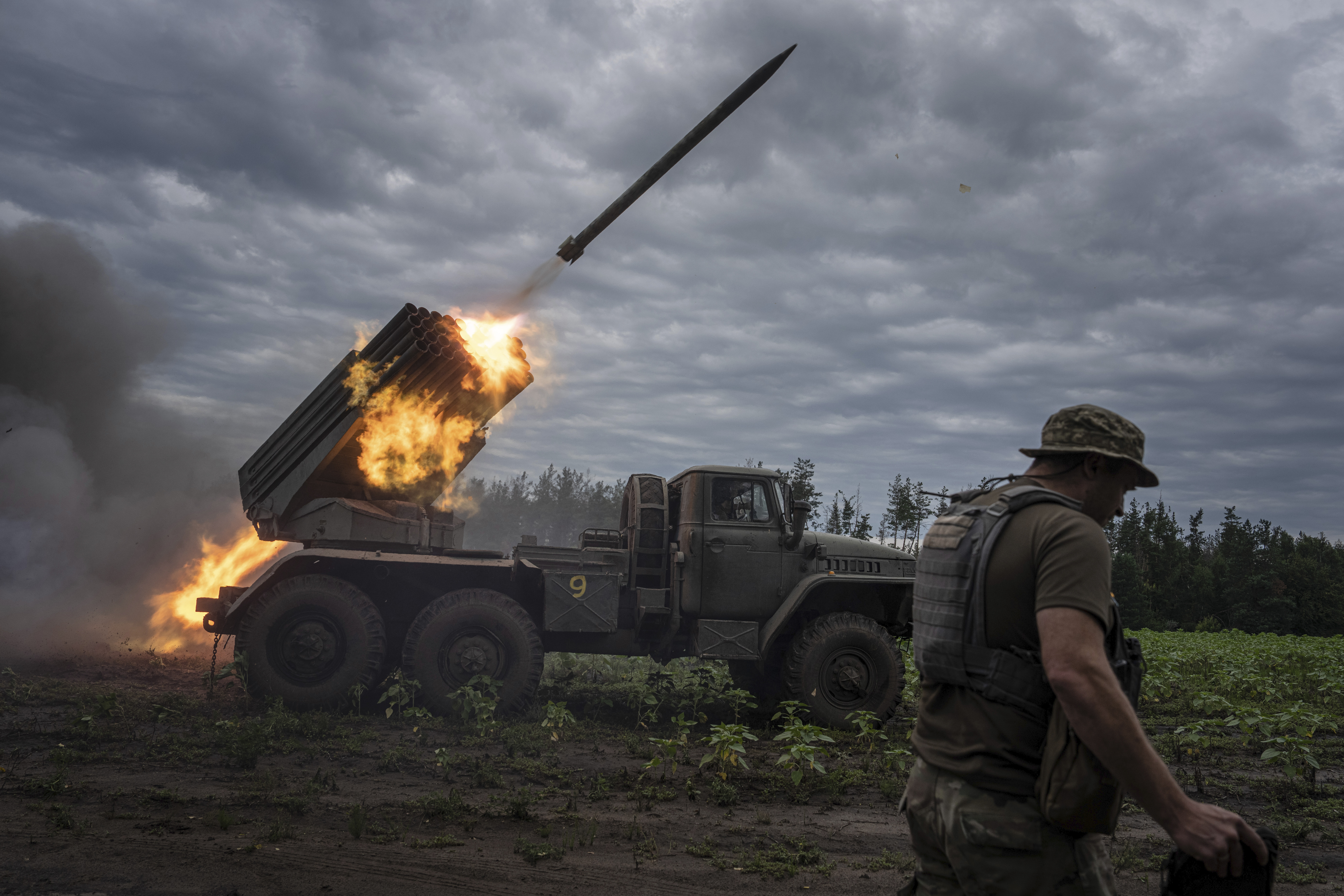Ukrainian MSLR "Verba" shoots toward Russian positions at the frontline in Kharkiv region, Ukraine, on Tuesday, Aug. 2, 2022.(AP Photo/Evgeniy Maloletka)