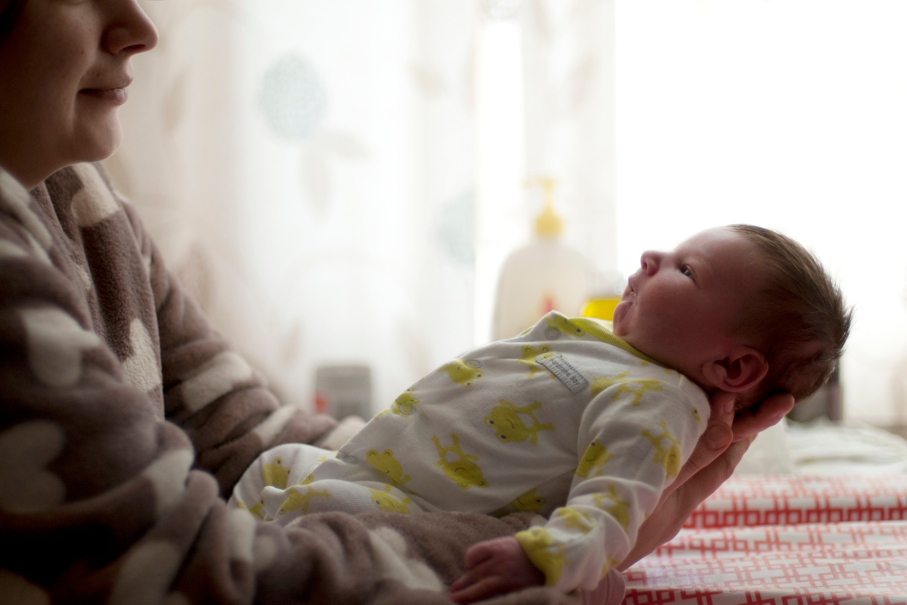 Mother holding baby, Image: 295682404, License: Royalty-free, Restrictions: , Model Release: yes, Credit line: - / PhotoAlto / Profimedia