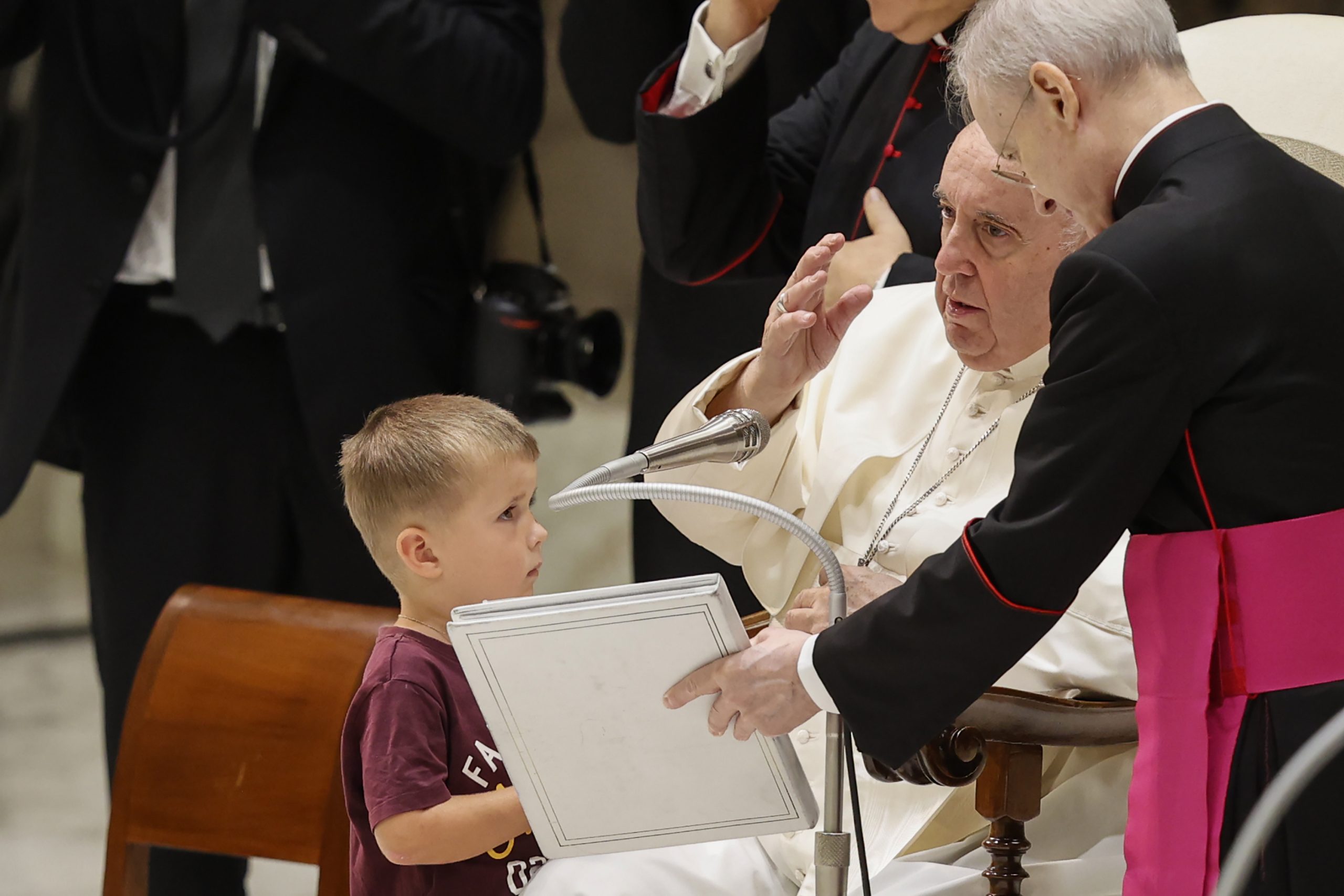 Pope Francis delivers his blessing to the faithful at the end of his weekly general audience In the Paul VI hall at the Vatican, Wednesday, Aug. 17, 2022. (AP Photo/Riccardo De Luca)