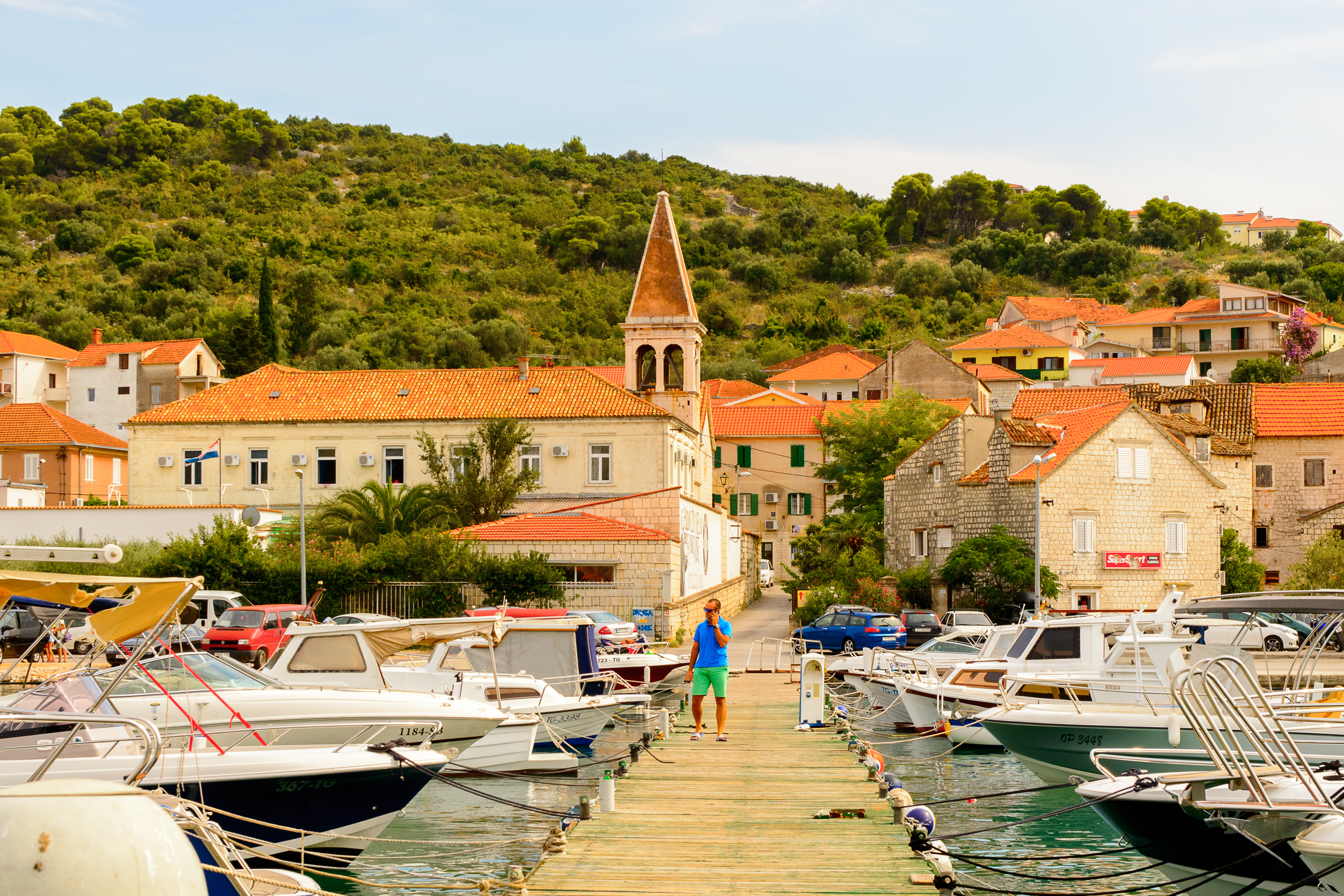 Hrvatska, ČIOVO, CROATIA - AUG 22, 2014: Boats on the Adriatic Sea near the coast of Ciovo, small Croatian Island. Ciovo is an island in the Adriatic Sea with area of 28.8 km2