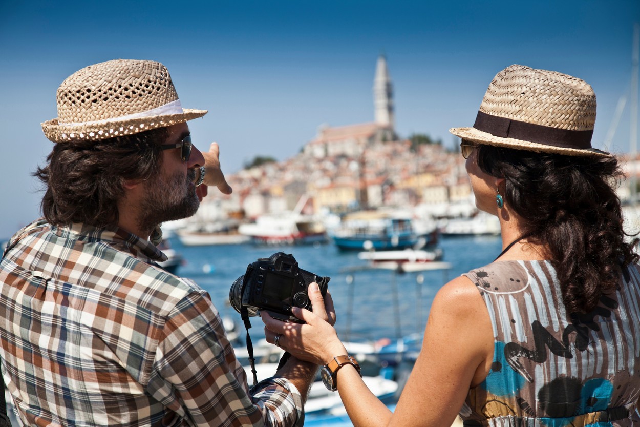 Couple looking at digital photos