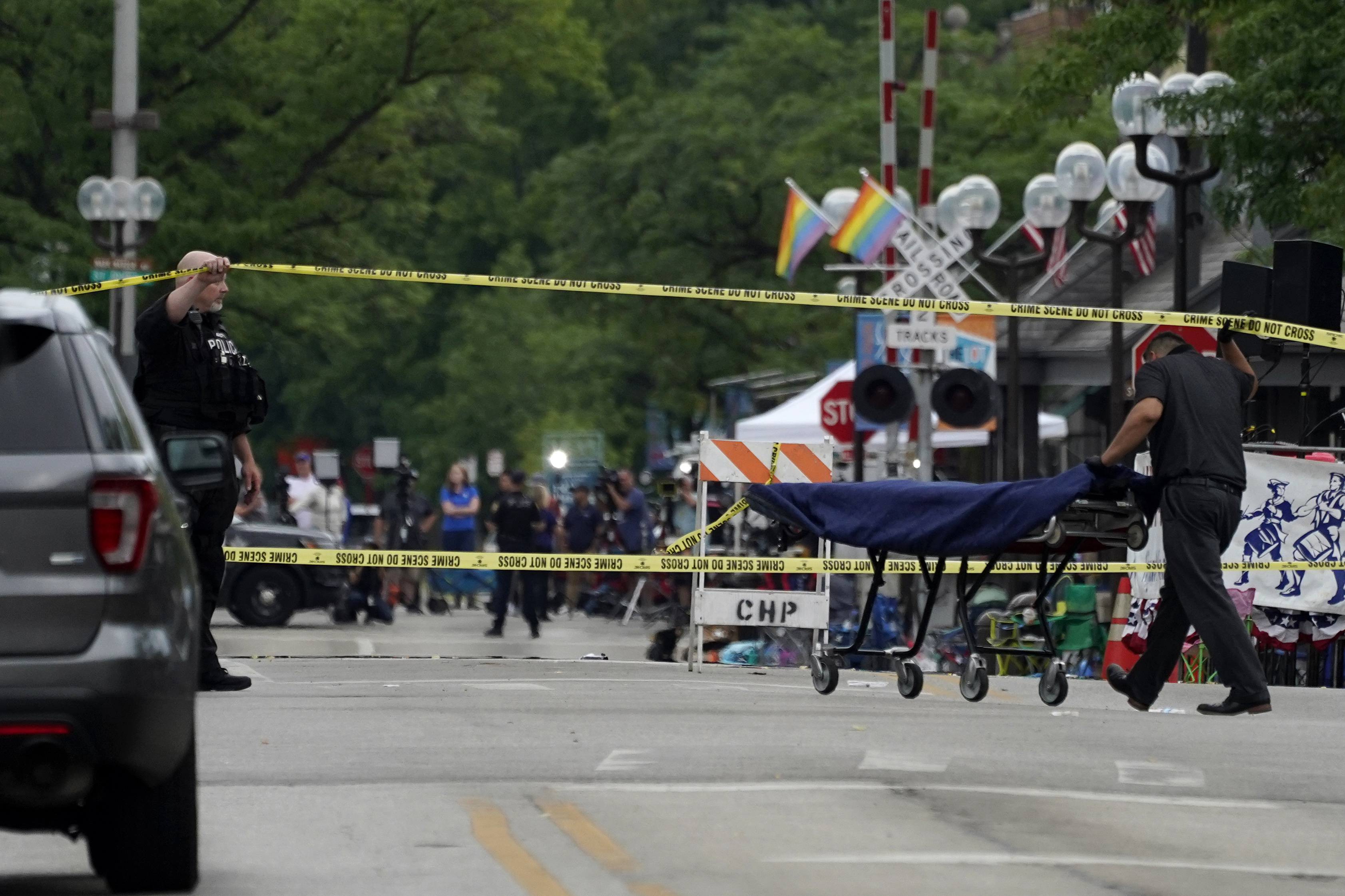 A stretcher is seen after a mass shooting at the Highland Park Fourth of July parade in downtown Highland Park, Ill., a Chicago suburb, Monday, July 4, 2022. (AP Photo/Nam Y. Huh)
