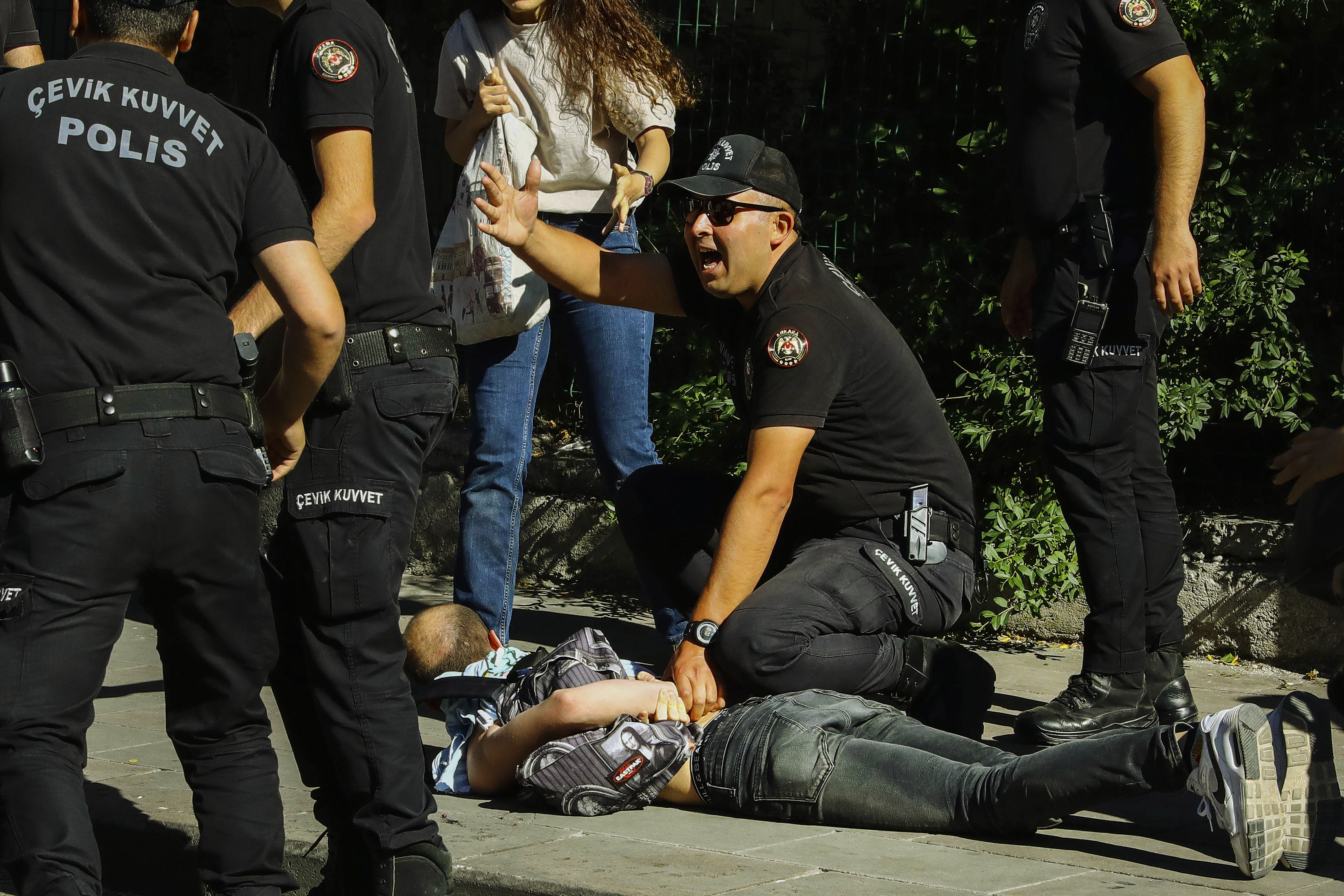 A man is detained during the LGBTQ Pride March in Ankara, Turkey, Tuesday, July 5, 2022. Police in Turkey’s capital have broken up a LGBTQ Pride march and detained dozens of people. Turkish authorities have banned LGBTQ events. (AP Photo/Ali Unal)