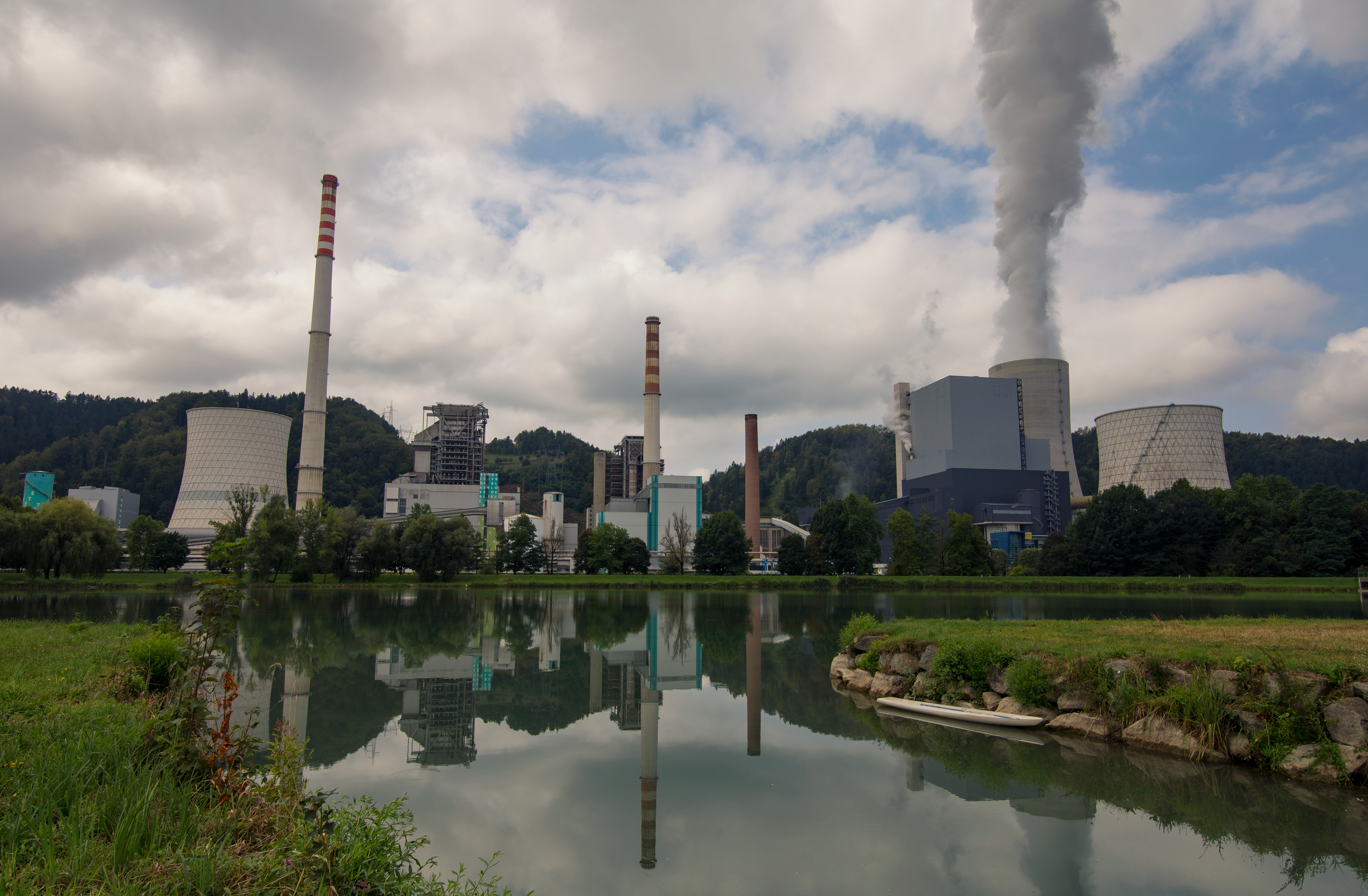 Power,Plant,Reflectinfg,In,The,Lake