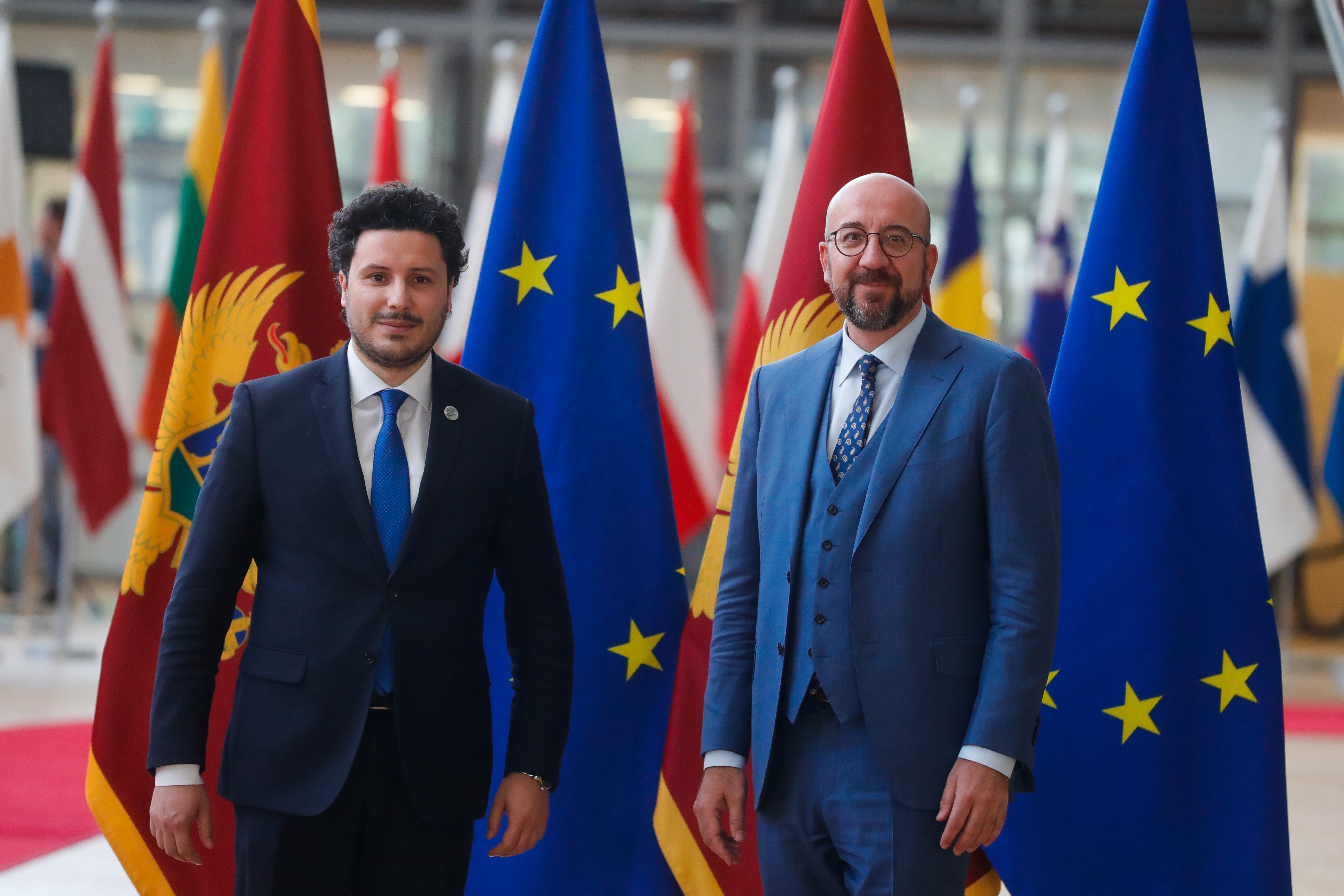 epa09952862 President of the European Council Charles Michel (R) and Montenegro's Prime Minister Dritan Abazovic (L) pose for an official photo prior to a meeting at the European Council in Brussels, Belgium, 17 May 2022.  EPA-EFE/STEPHANIE LECOCQ