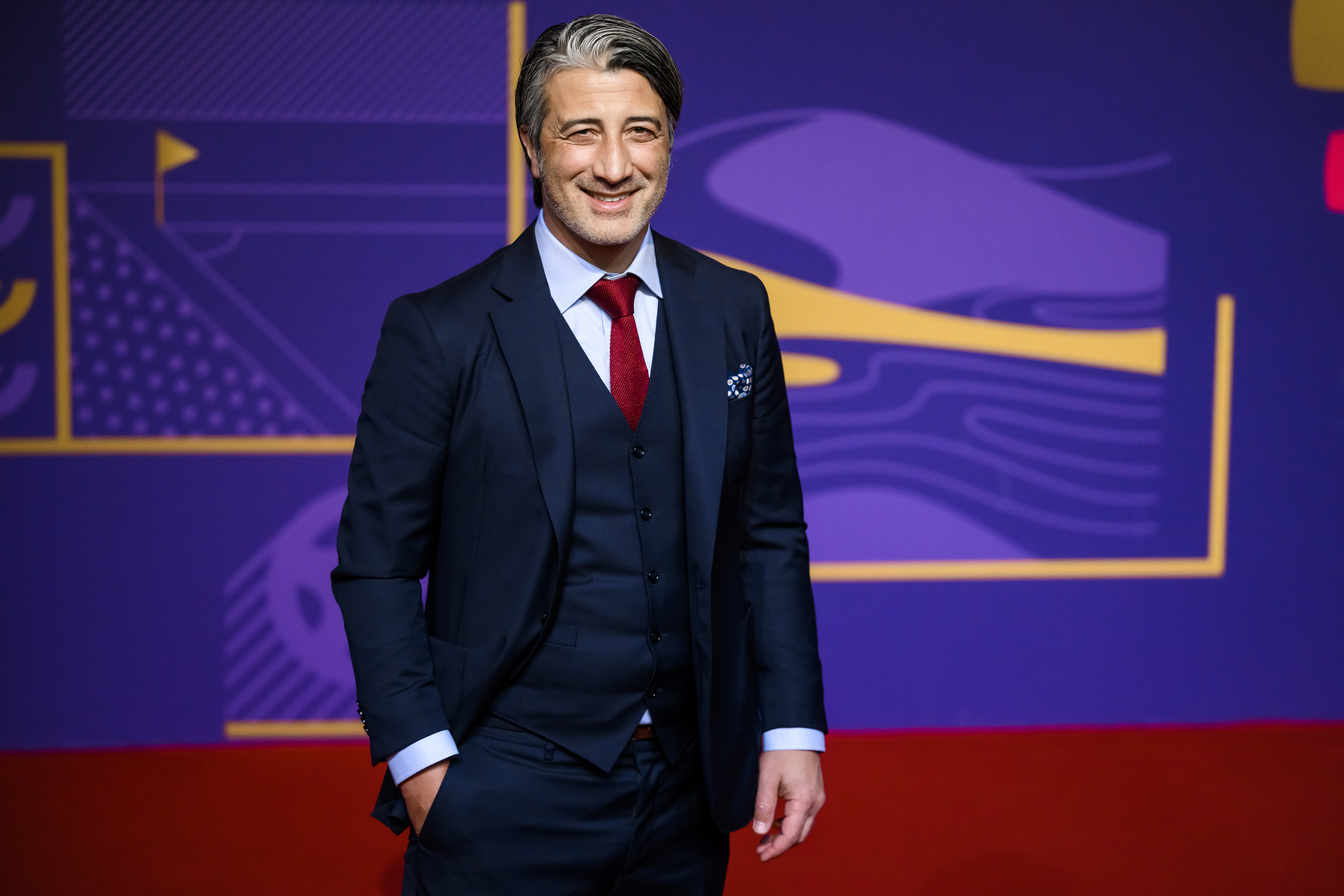 epa09863746 Switzerland's national soccer team head coach Murat Yakin arrives for the main draw of the FIFA World Cup 2022 at the Doha Exhibition &amp; Convention Center (DECC) in Doha, Qatar, 01 April 2022.  EPA-EFE/LAURENT GILLIERON