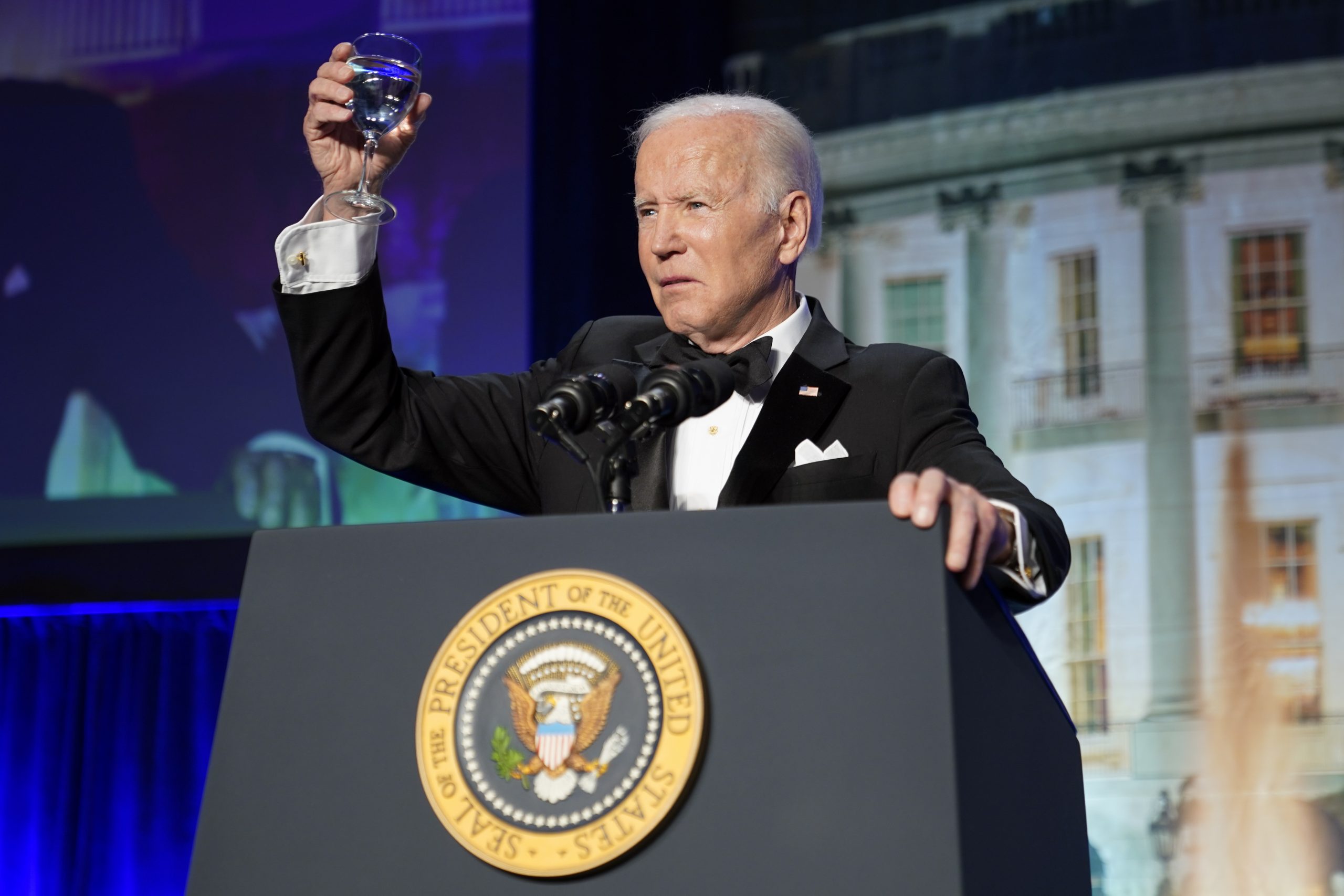 President Joe Biden proposes a toast as he speaks at the annual White House Correspondents' Association dinner, Saturday, April 30, 2022, in Washington. (AP Photo/Patrick Semansky)