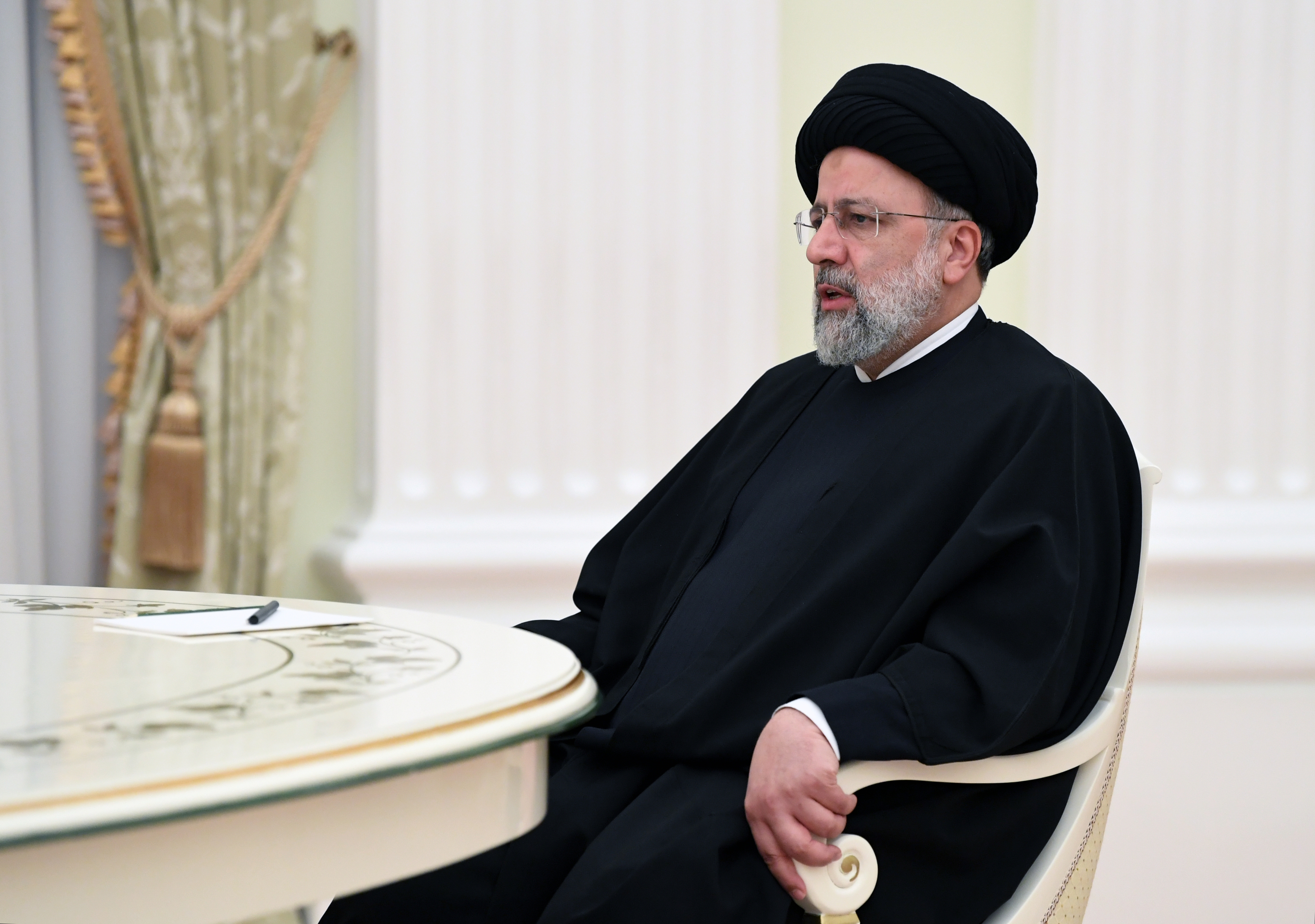 epa09695193 Iranian President Ebrahim Raisi attends a meeting with Russian President Vladimir Putin (not pictured) in the Kremlin  in Moscow, Russia, 19 January 2022.  EPA-EFE/PAVEL BEDNYAKOV / KREMLIN POOL / SPUTNIK MANDATORY CREDIT