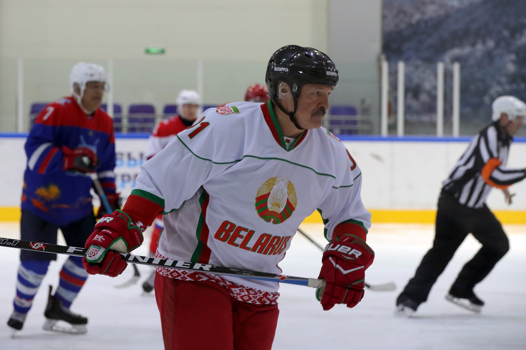 Russia: Presidents of Russia and Belarus play ice hockey in Sochi
