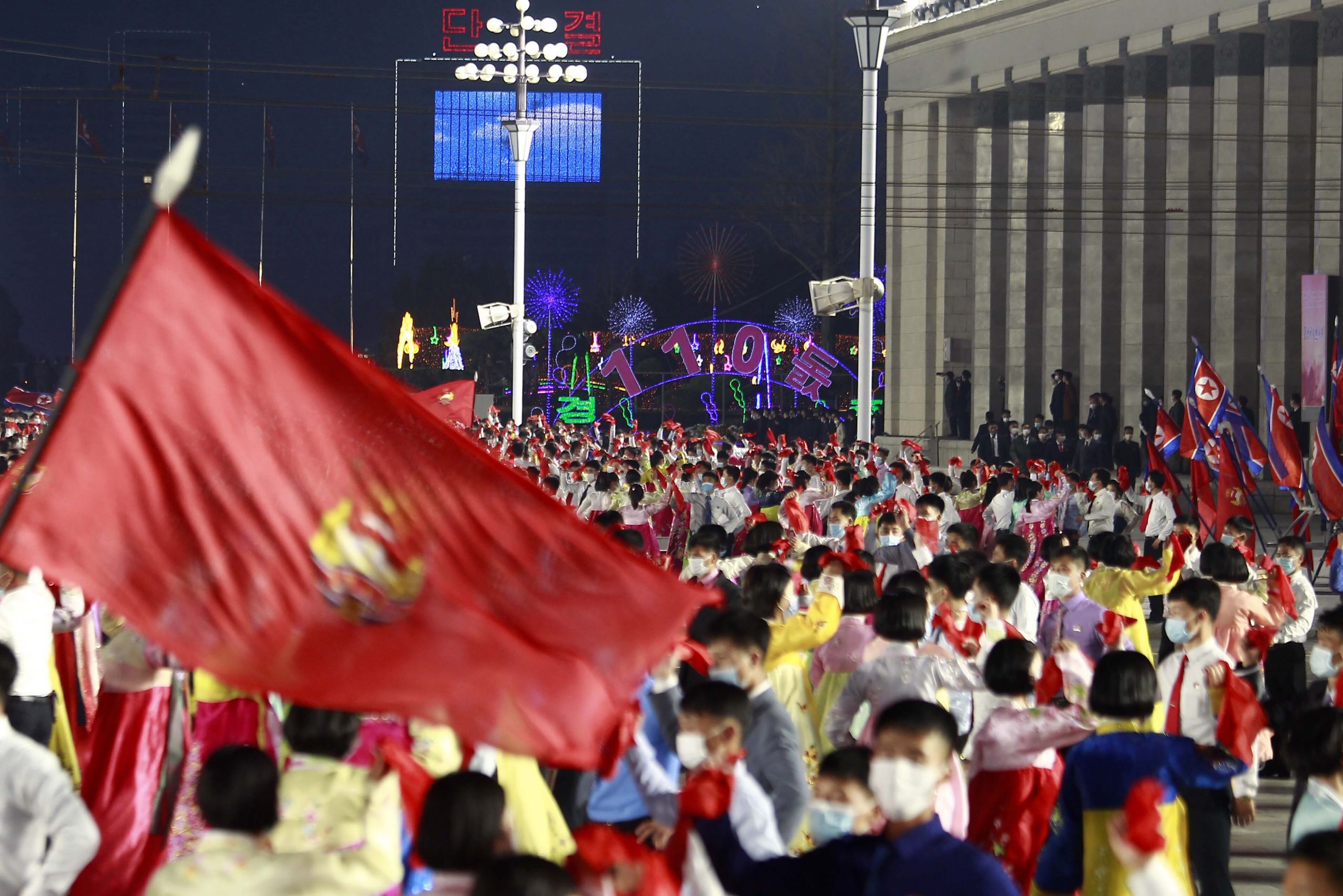 Students and youth attend a dancing party in celebration of the 110th birth anniversary of  its late founder Kim Il Sung at Kim Il Sung Square in Pyongyang, North Korea Friday, April 15, 2022. (AP Photo/Cha Song Ho)