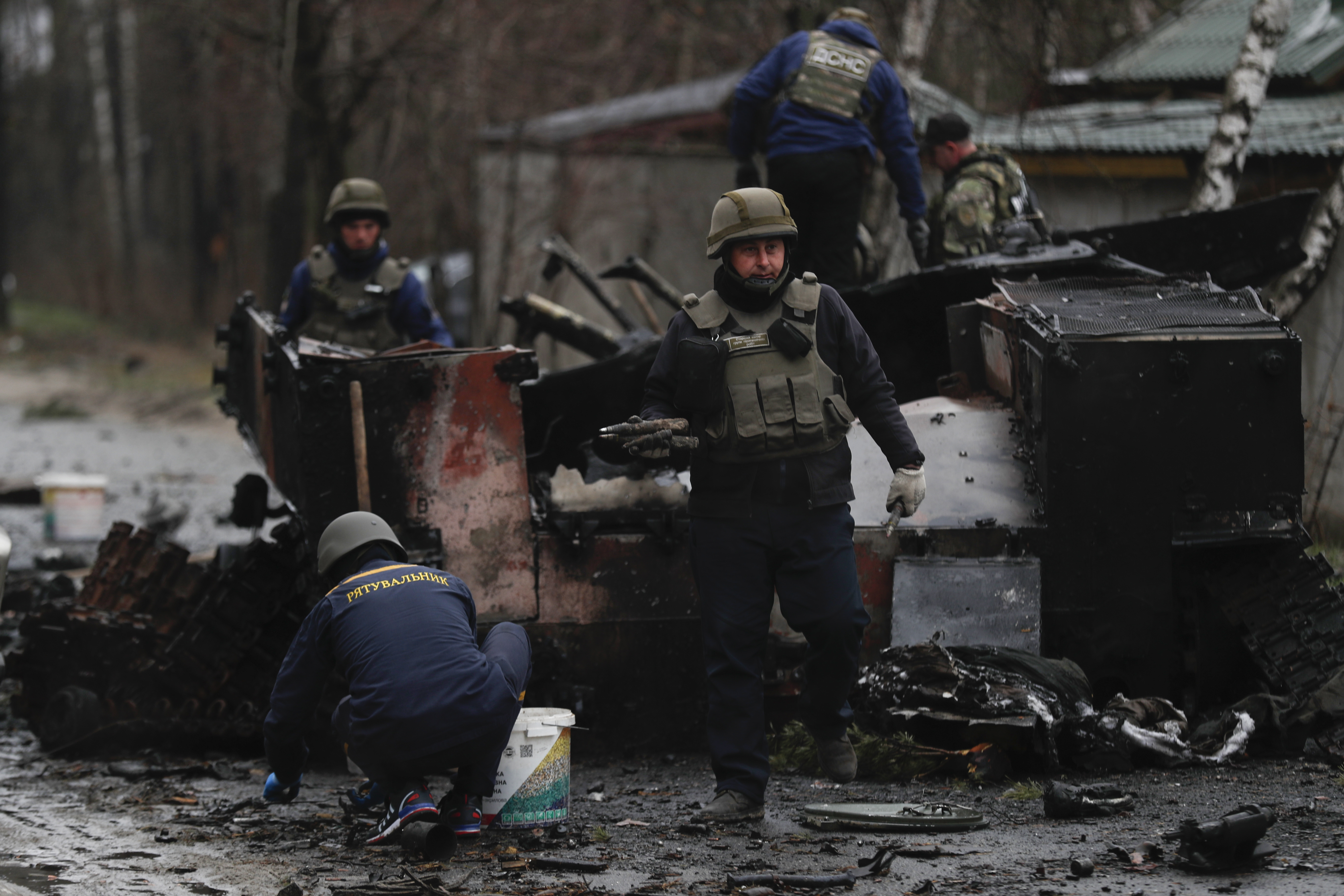 Ukrainian servicemen patrolling in the city of Irpin