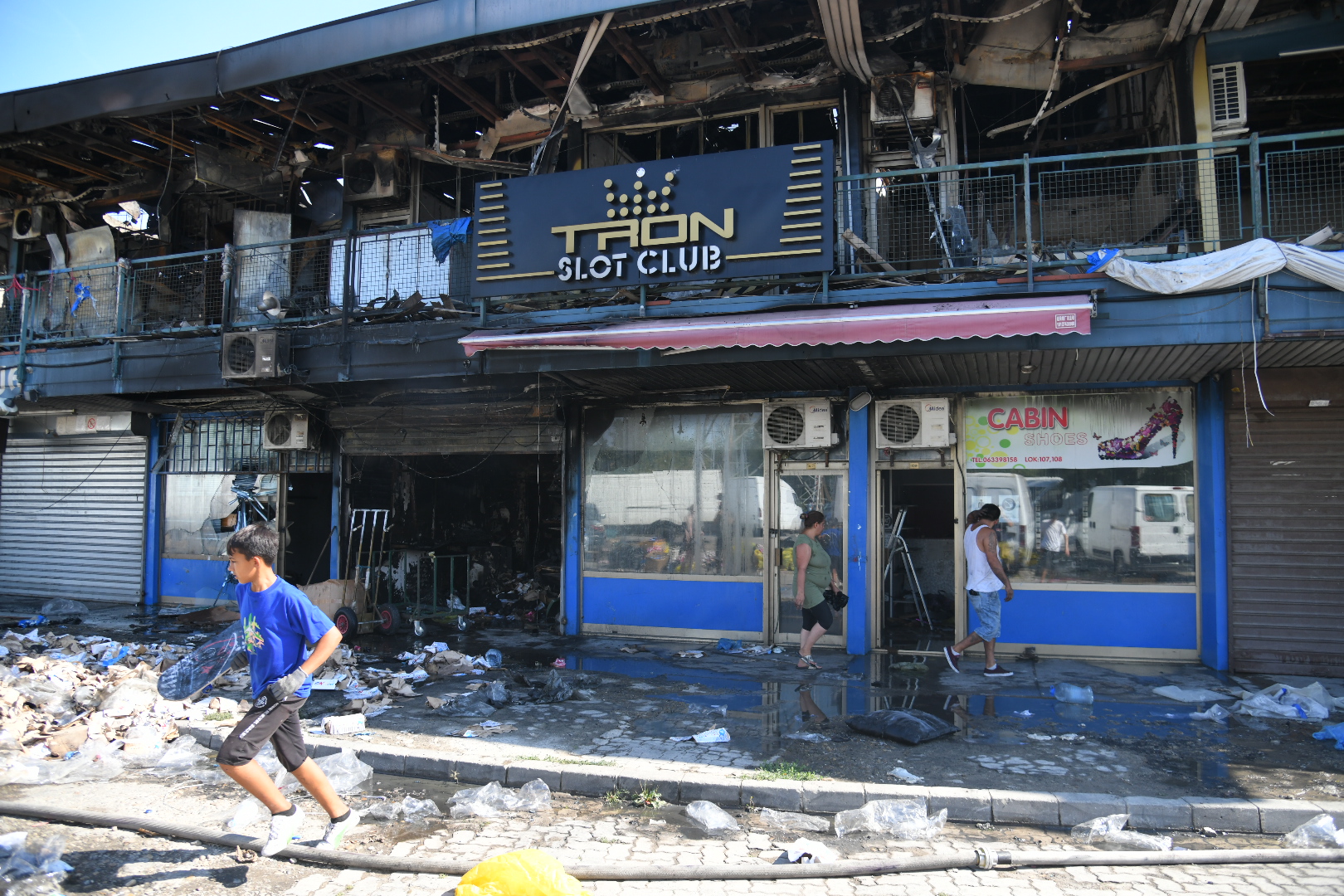 Beograd, 13.08.2021. Požar Blok 70, kineski tržni centar požar, ugašen požar, posledice požara, čišćenje, spašavanje robe Foto: Nemanja Jovanović/Nova.rs