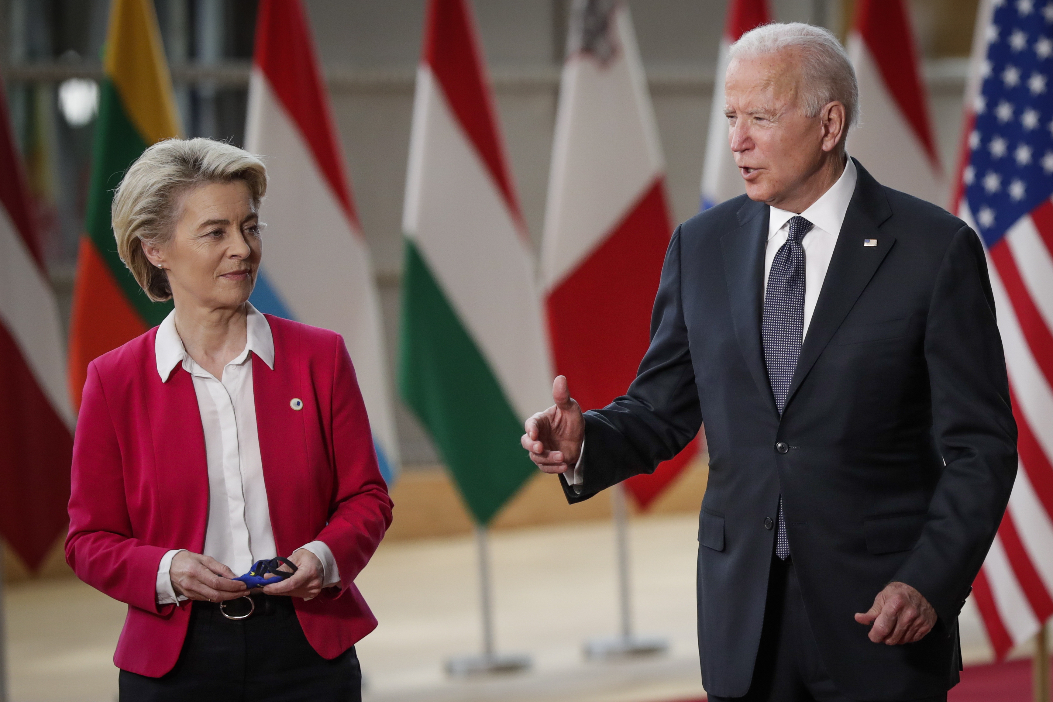 epa09272631 US president Joe Biden (R) is welcomed by President of the European Commission Ursula von der Leyen (L) ahead to the EU-US summit at the European Council in Brussels, Belgium, 15 June 2021.  EPA-EFE/OLIVIER HOSLET