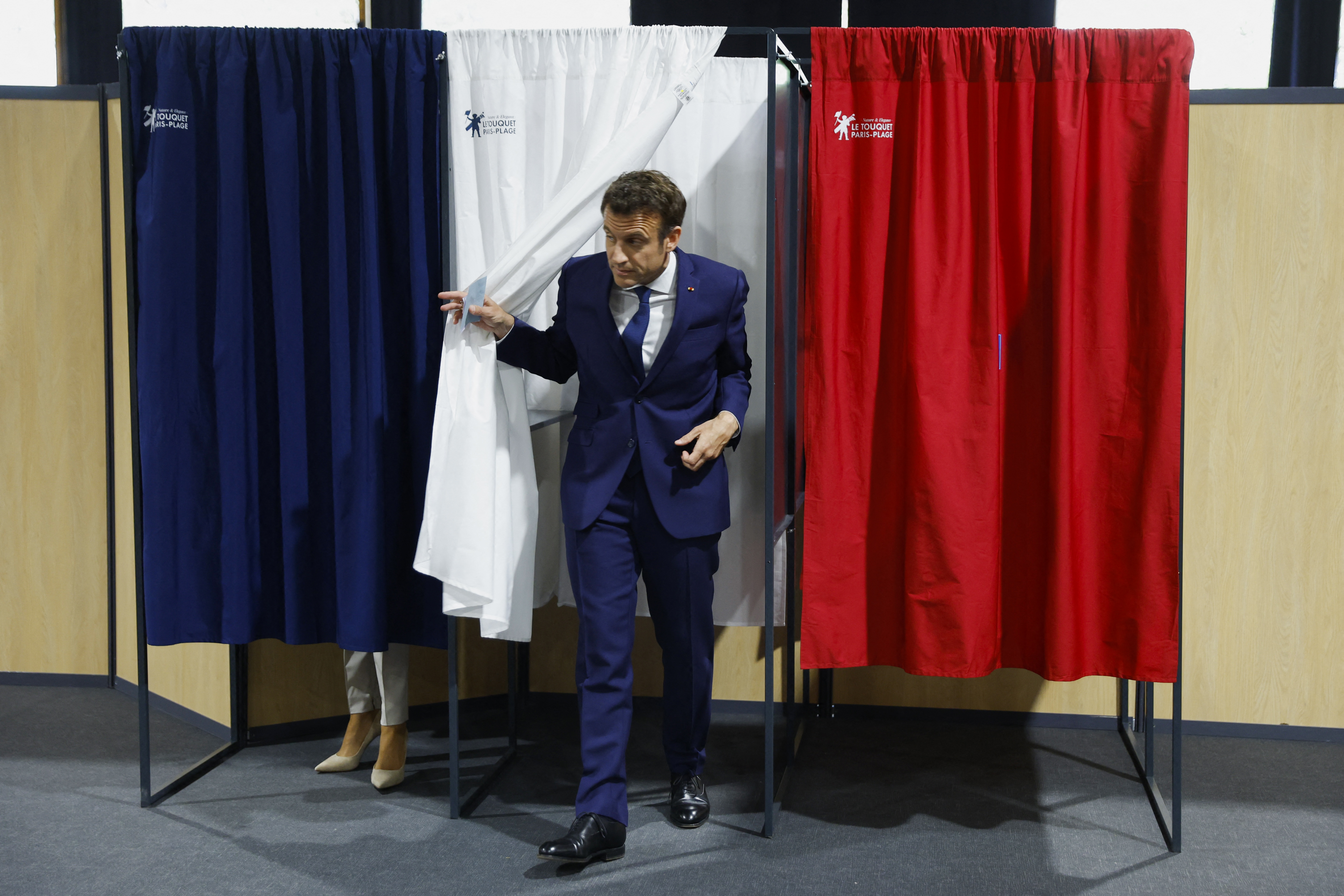 Macron votes in the second round of the French presidential elections