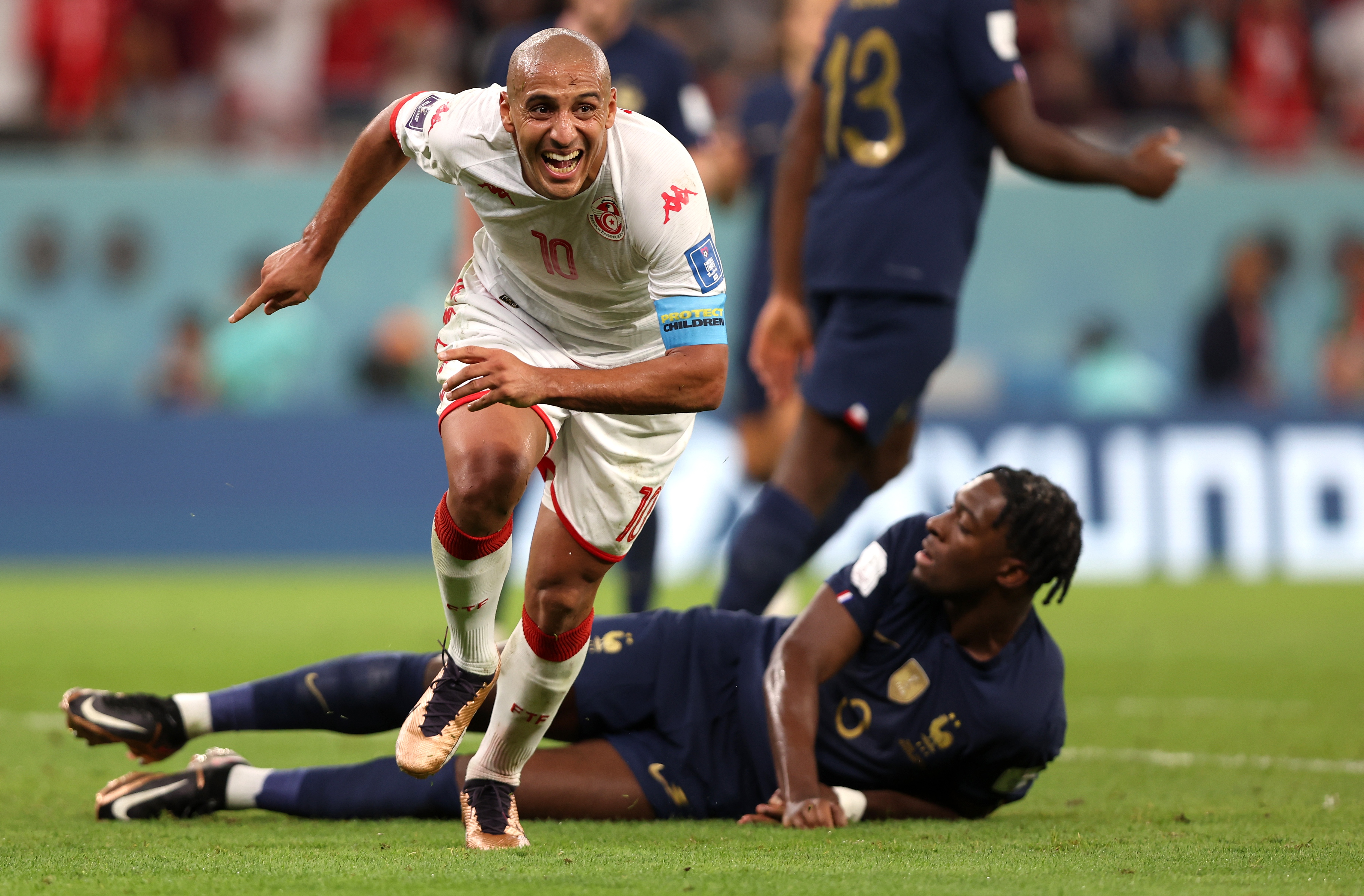 epa10339245 Wahbi Khazri of Tunisia celebrates after scoring the opening goal during the FIFA World Cup 2022 group D soccer match between Tunisia and France at Education City Stadium in Doha, Qatar, 30 November 2022.  EPA-EFE/Tolga Bozoglu