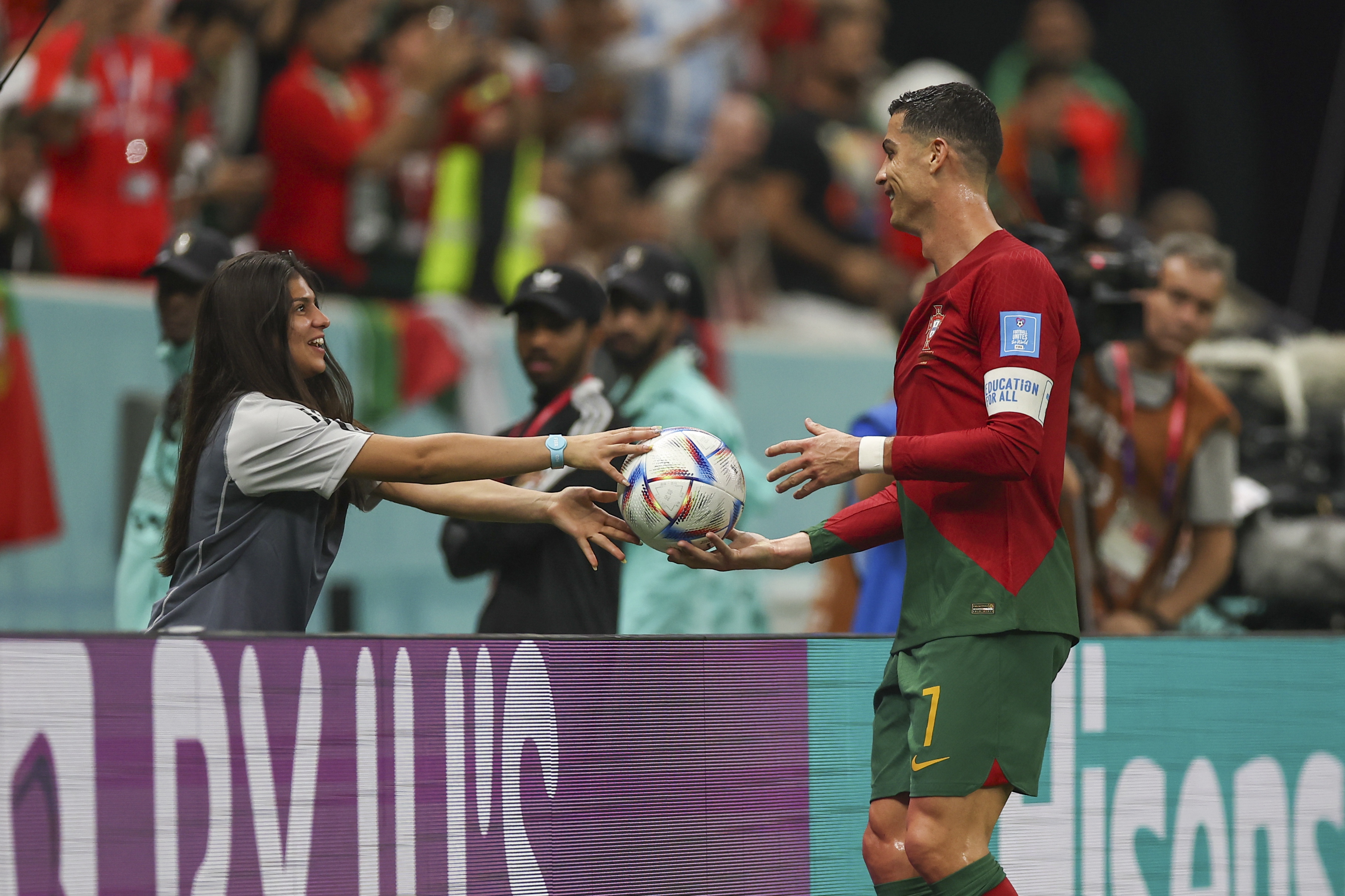 epa10352995 Cristiano Ronaldo of Portugal is given a ball by a ball girl during the FIFA World Cup 2022 round of 16 soccer match between Portugal and Switzerland at Lusail Stadium in Lusail, Qatar, 06 December 2022.  EPA-EFE/JOSE SENA GOULAO