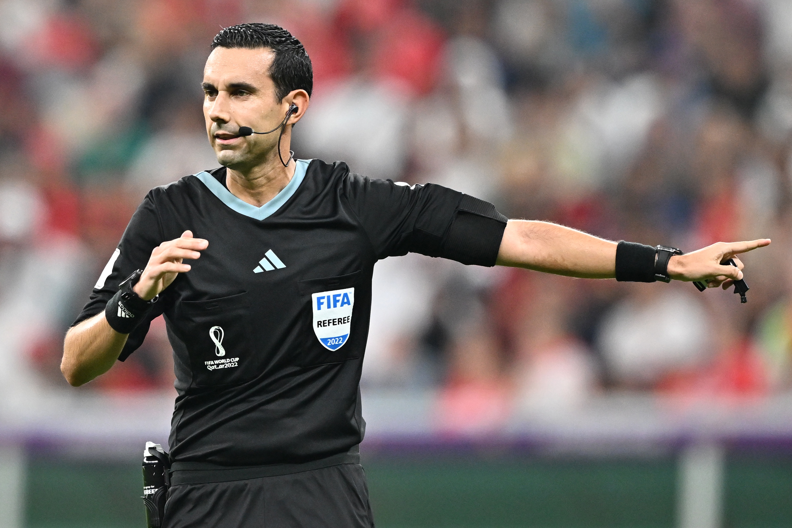 epa10352876 Mexican referee Cesar Arturo Ramos Palazuelos reacts during the FIFA World Cup 2022 round of 16 soccer match between Portugal and Switzerland at Lusail Stadium in Lusail, Qatar, 06 December 2022.  EPA-EFE/Noushad Thekkayil